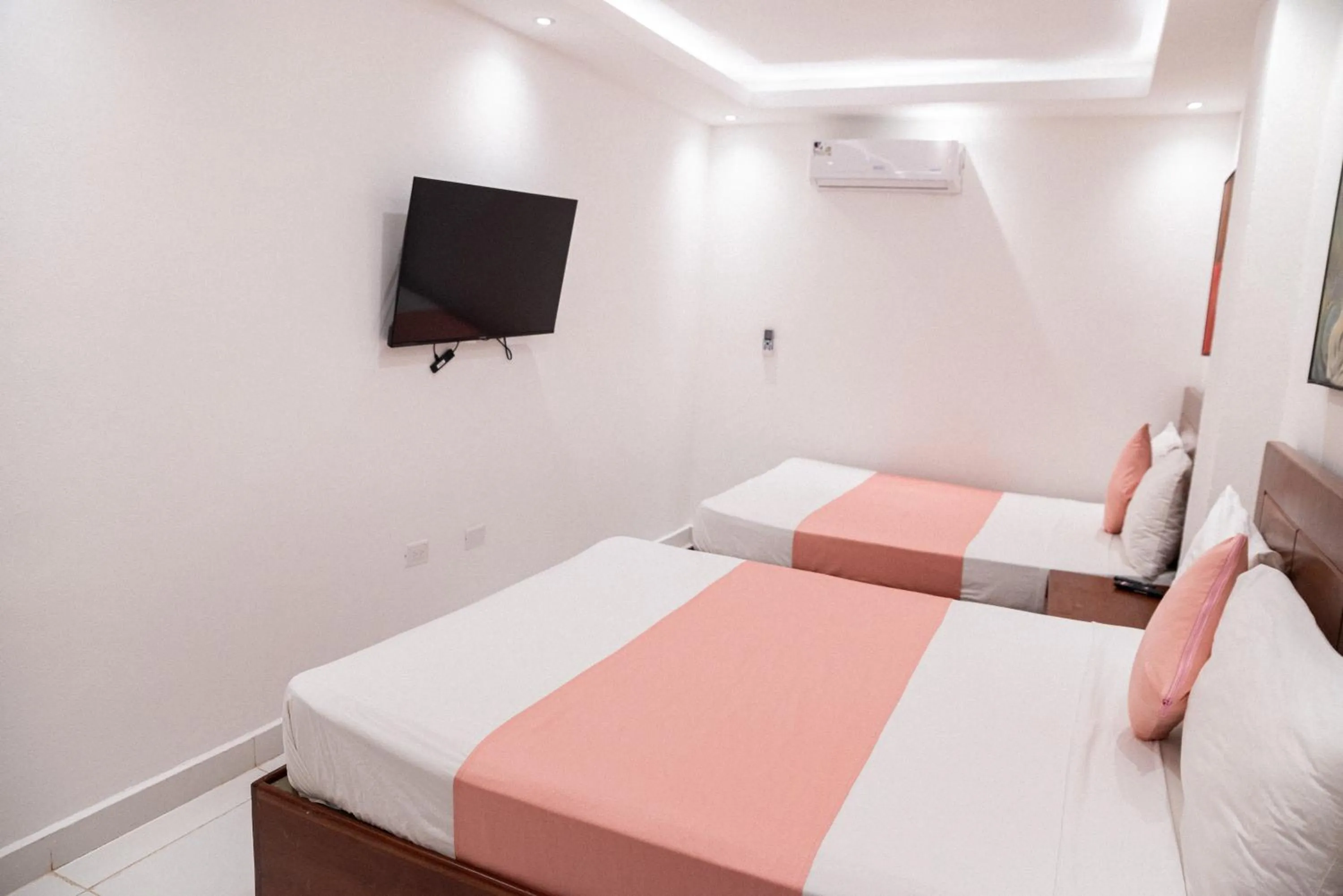 TV and multimedia, Bed in Cataleya Hotel