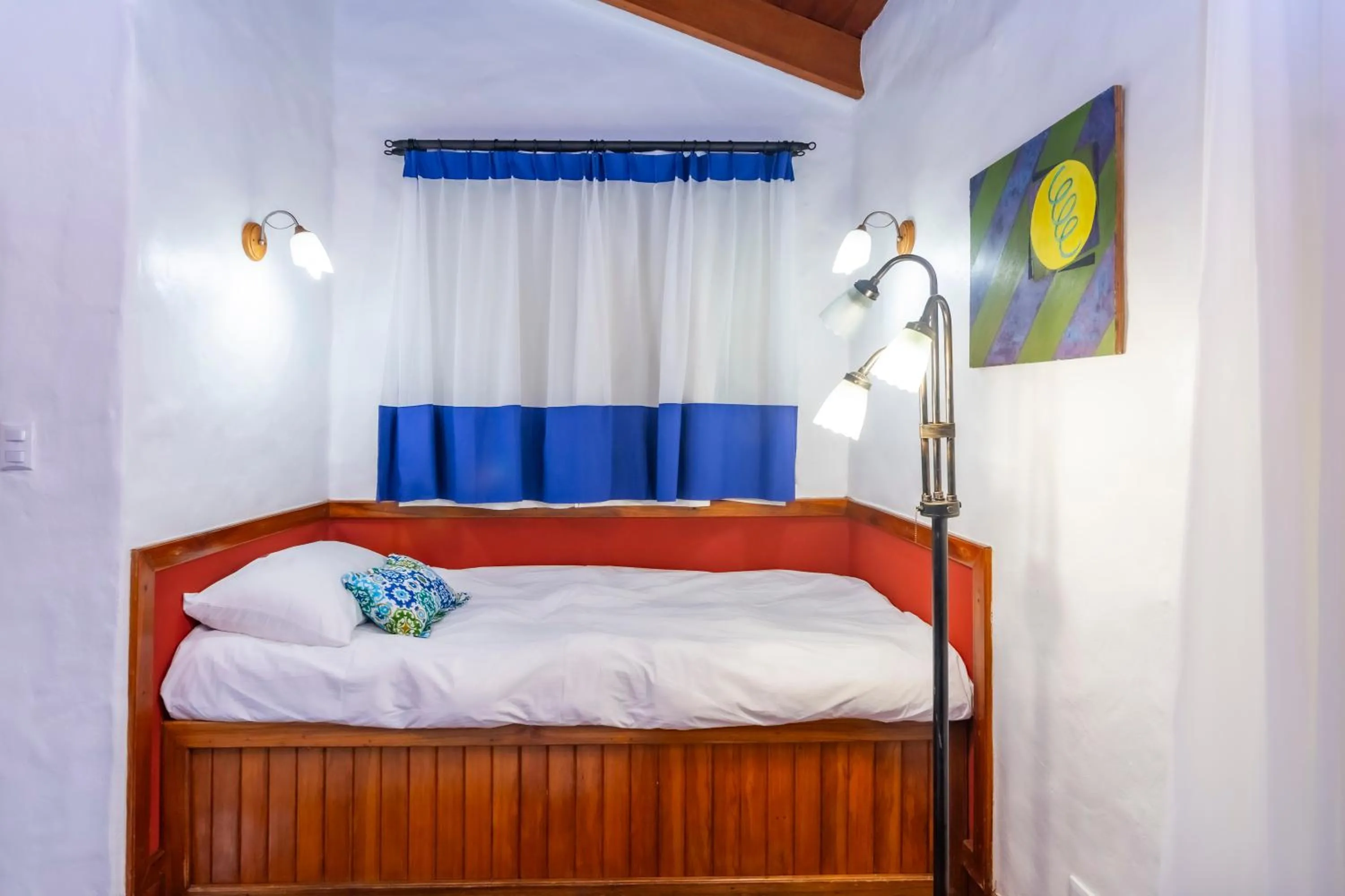 Bed in Finca Rosa Blanca Coffee Farm and Inn