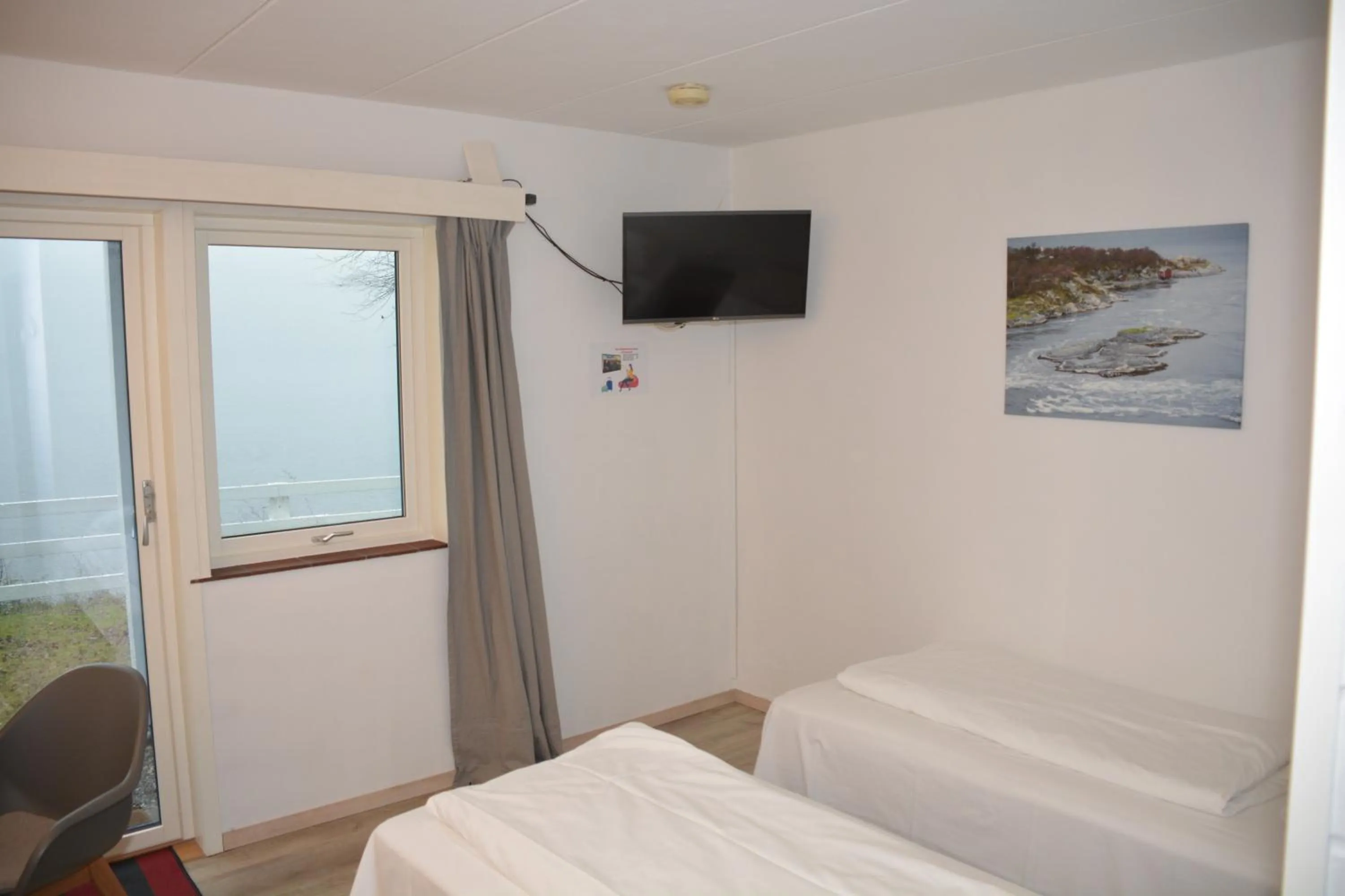 Bed in Langenuen Motel & Camping