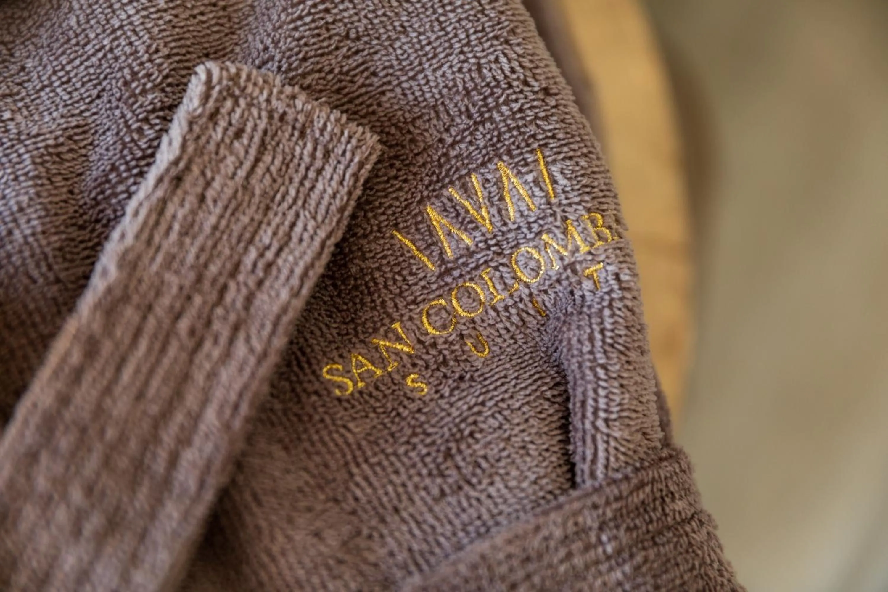 Property logo or sign in San Colombano Suites