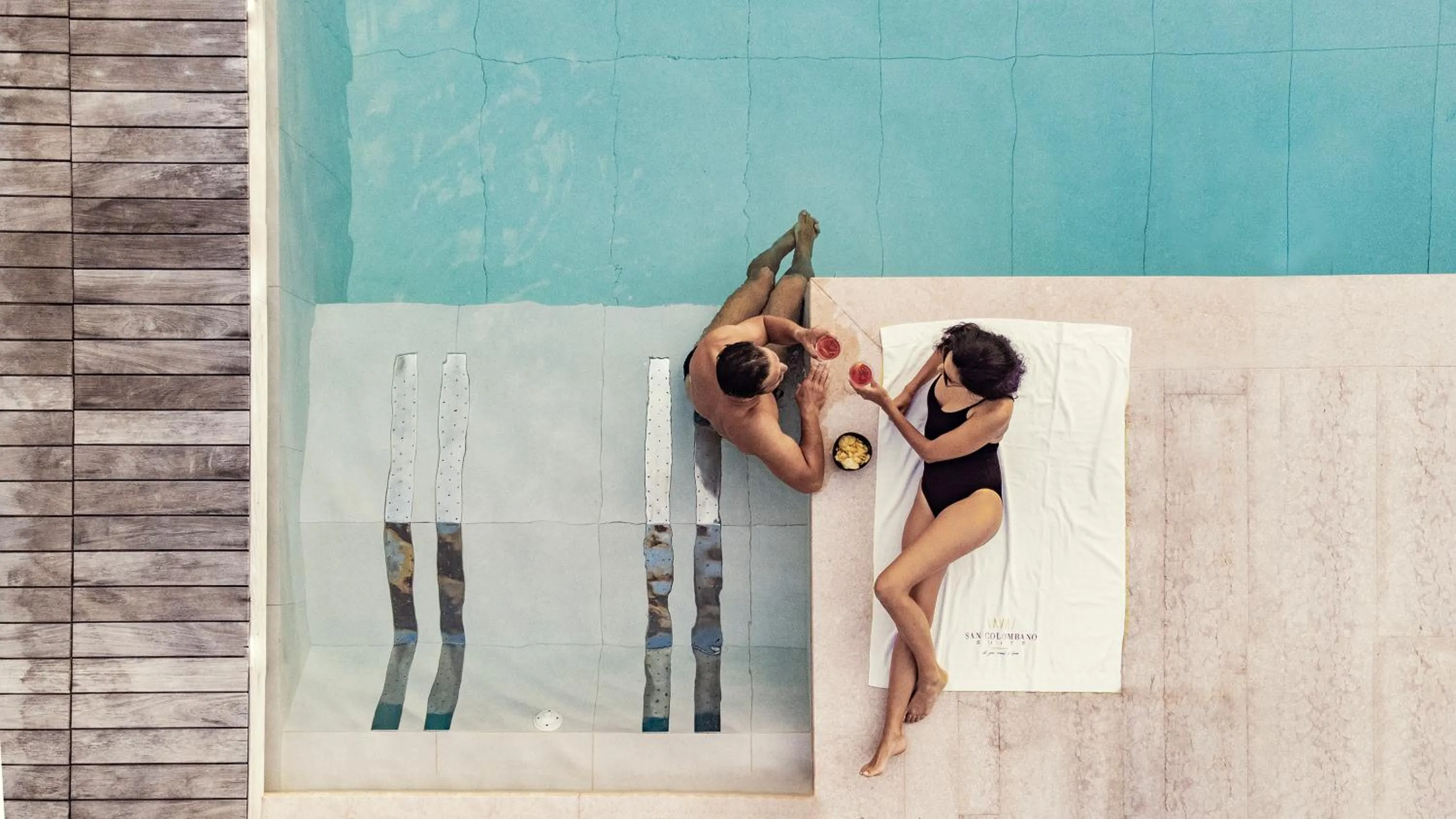 Swimming pool in San Colombano Suites