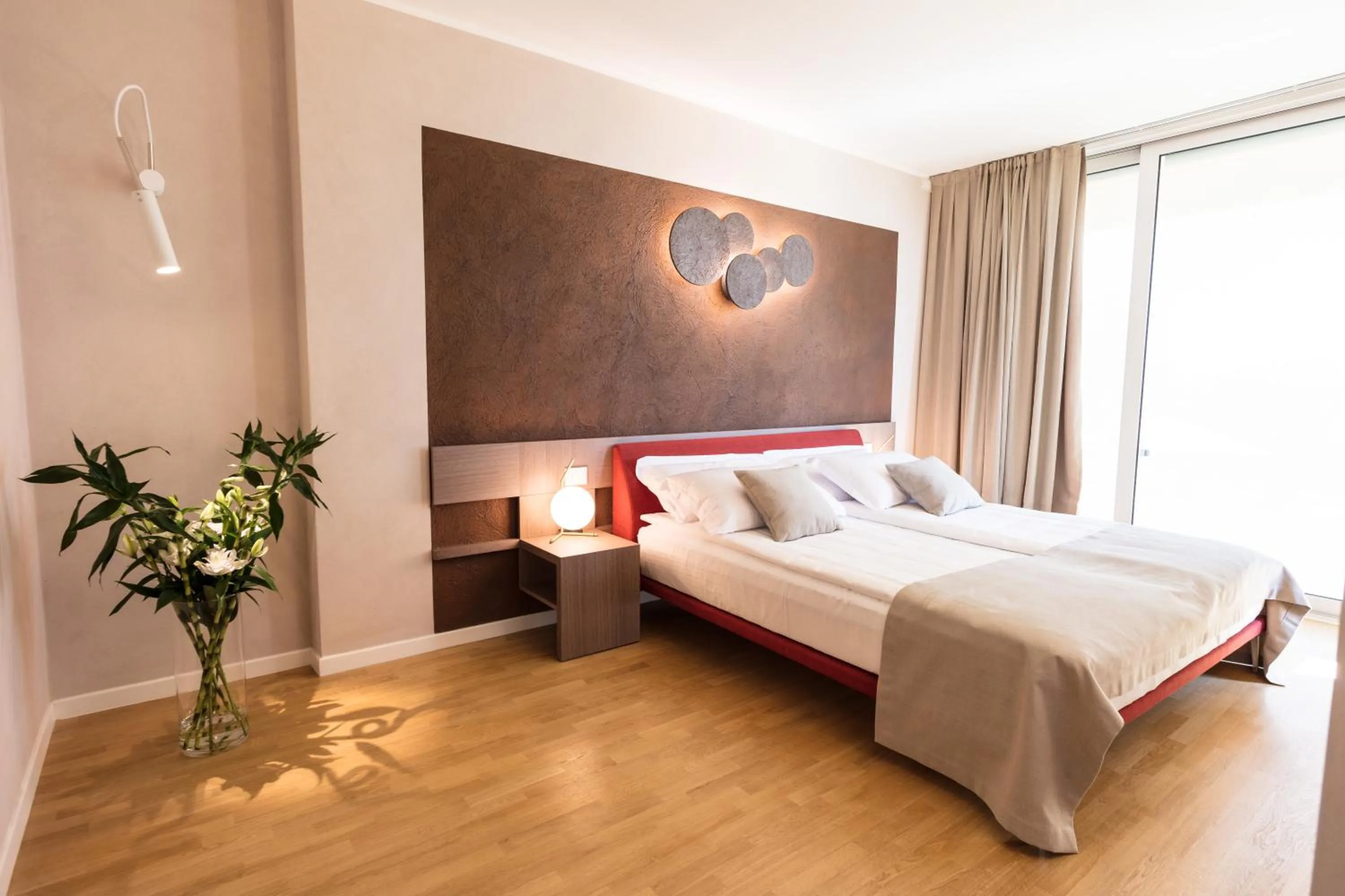 Bed in San Colombano Suites