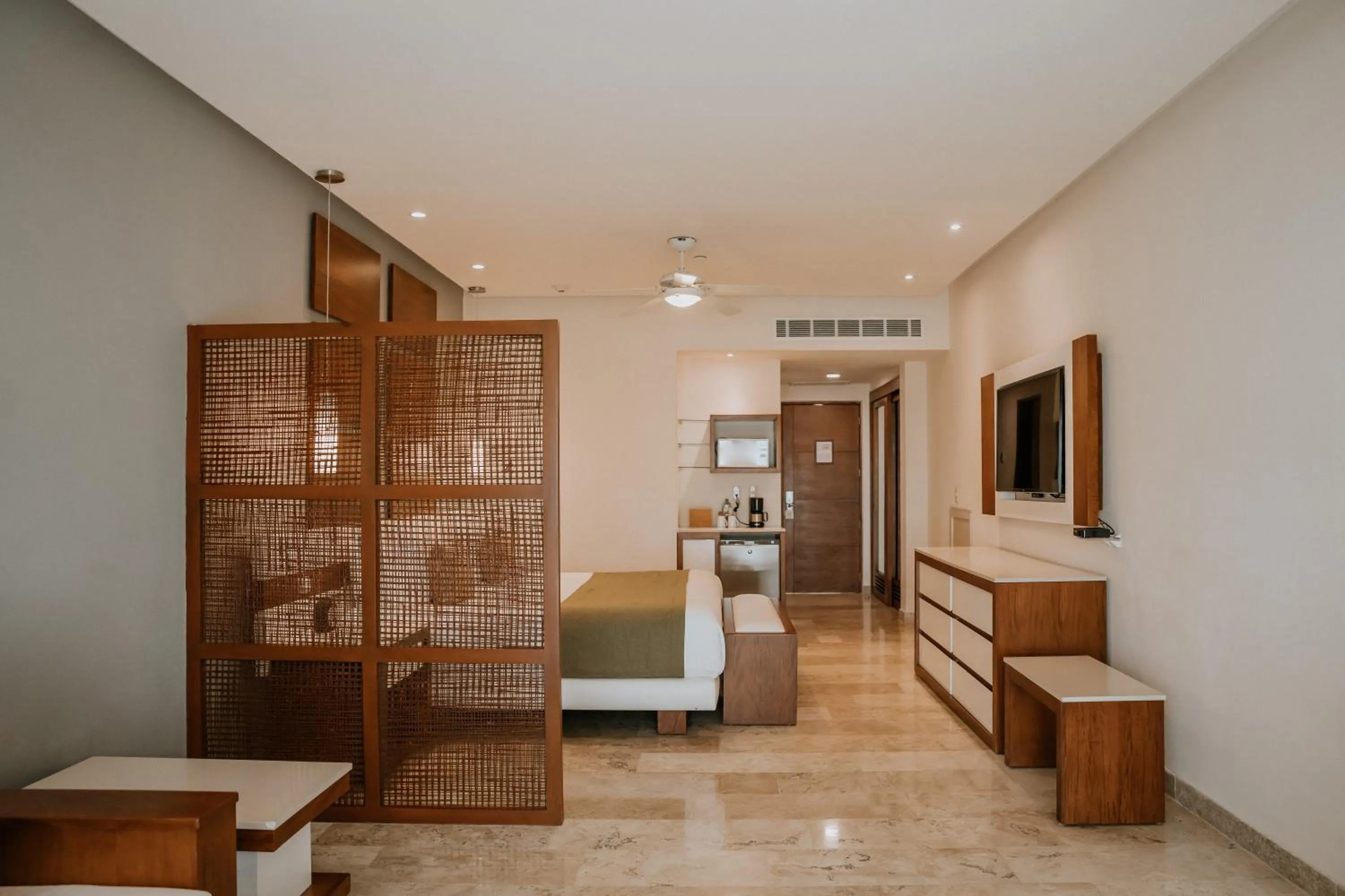 Communal lounge/ TV room in The Reef 28 Hotel & Spa - Luxury Adults Only - All Suites - With Optional All Inclusive