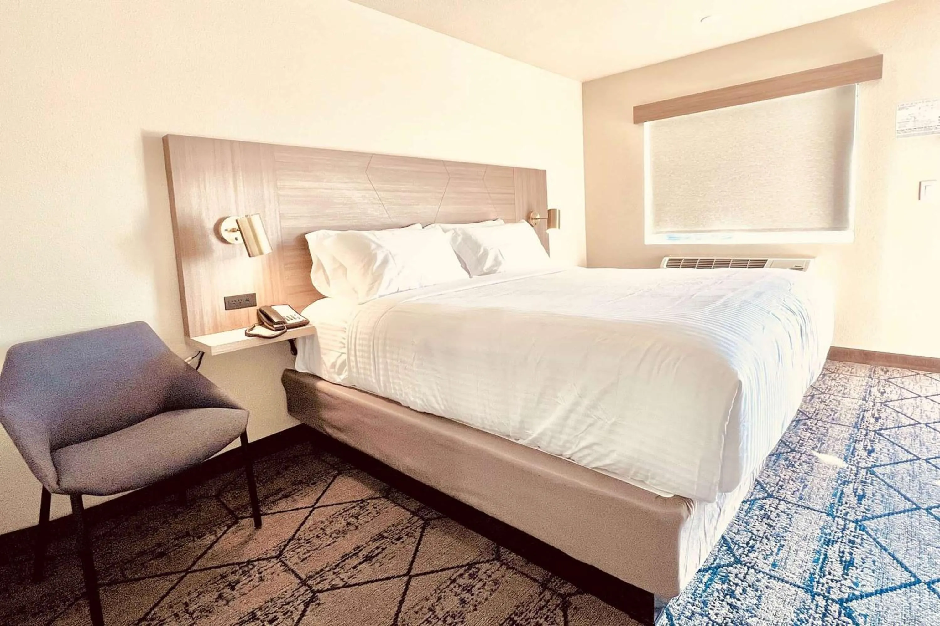 Photo of the whole room, Bed in Ramada by Wyndham Modesto Yosemite Area