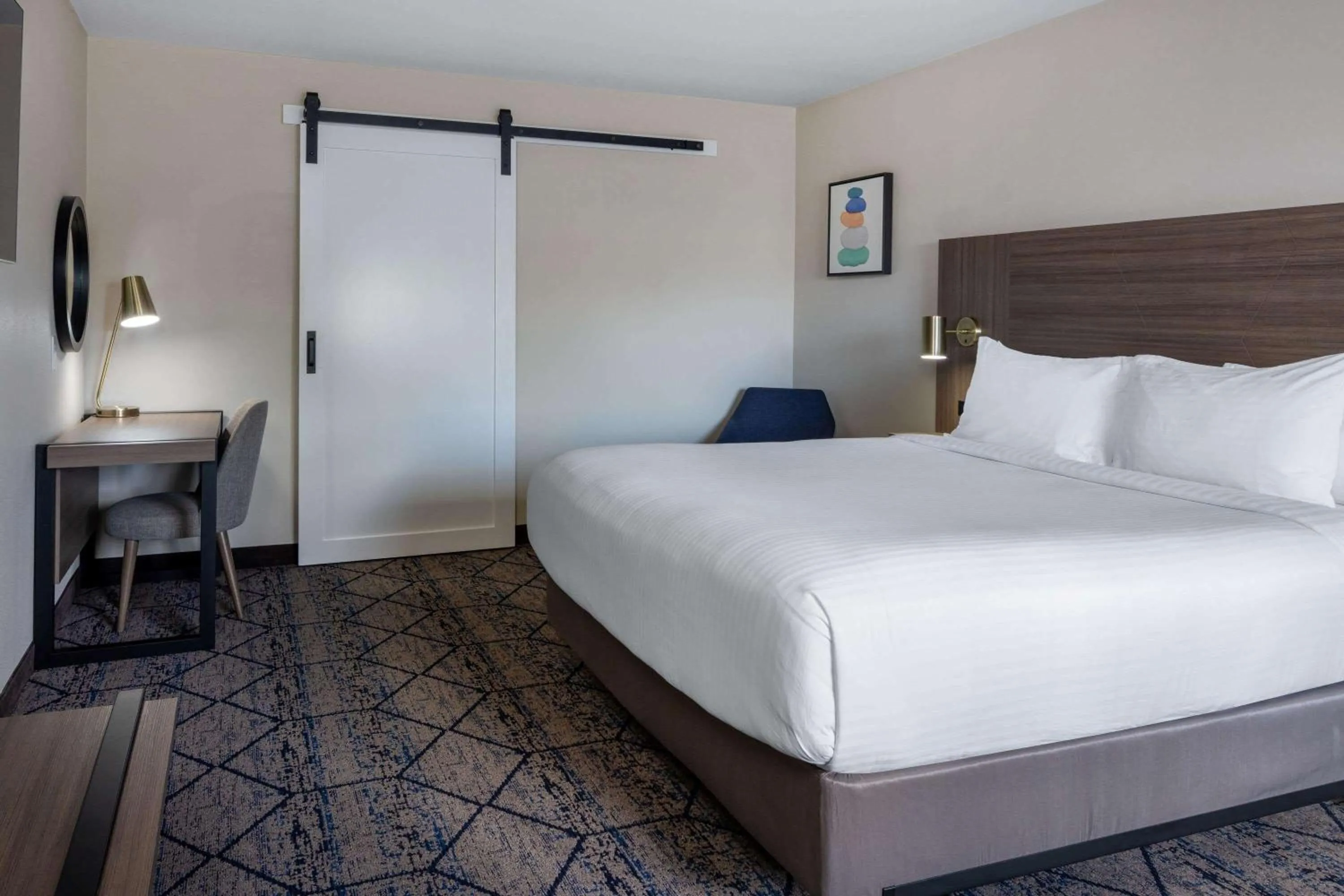 Photo of the whole room, Bed in Ramada by Wyndham Modesto Yosemite Area