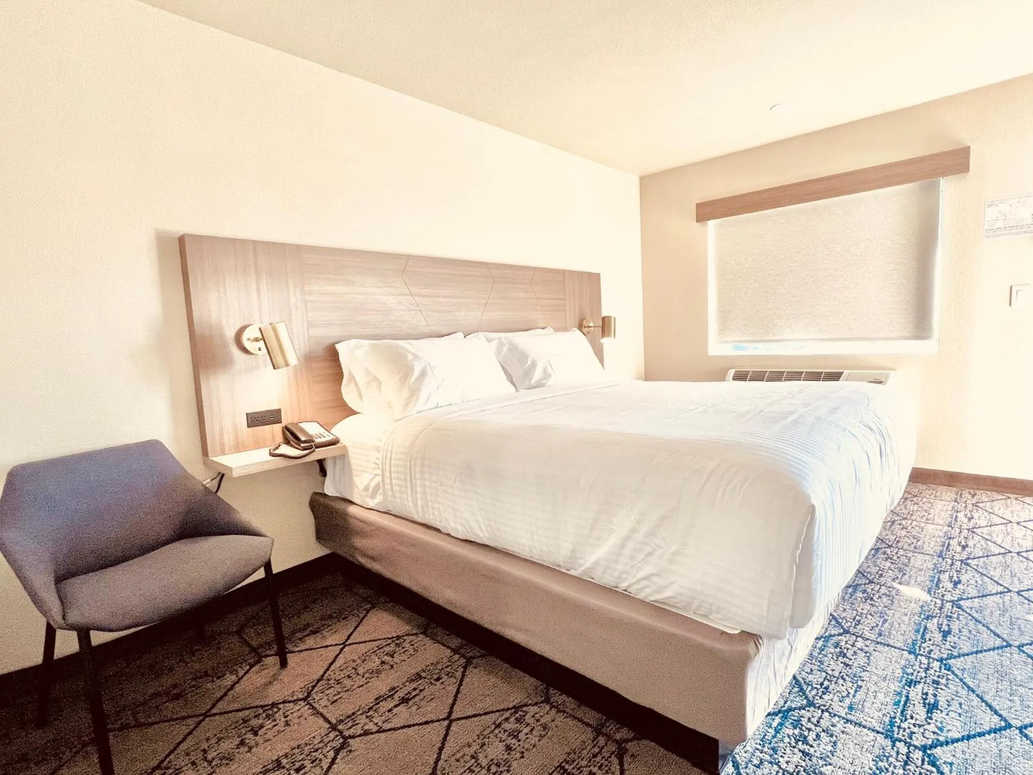 Bed in Ramada by Wyndham Modesto Yosemite Area