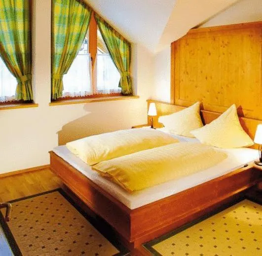 Bed in Tonis Appartements am Achensee