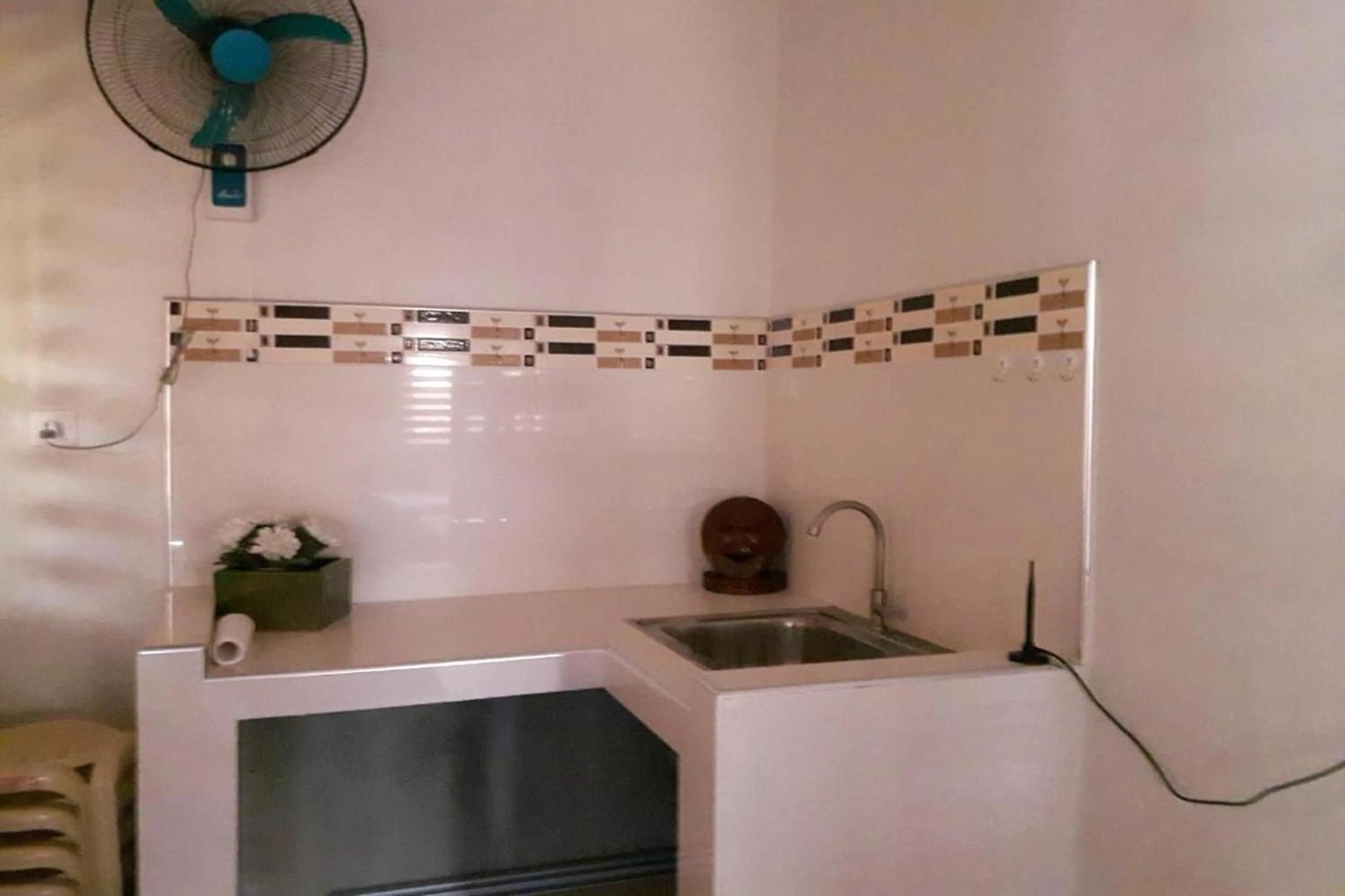 Kitchen or kitchenette in FNT Transient House near Hundred Islands