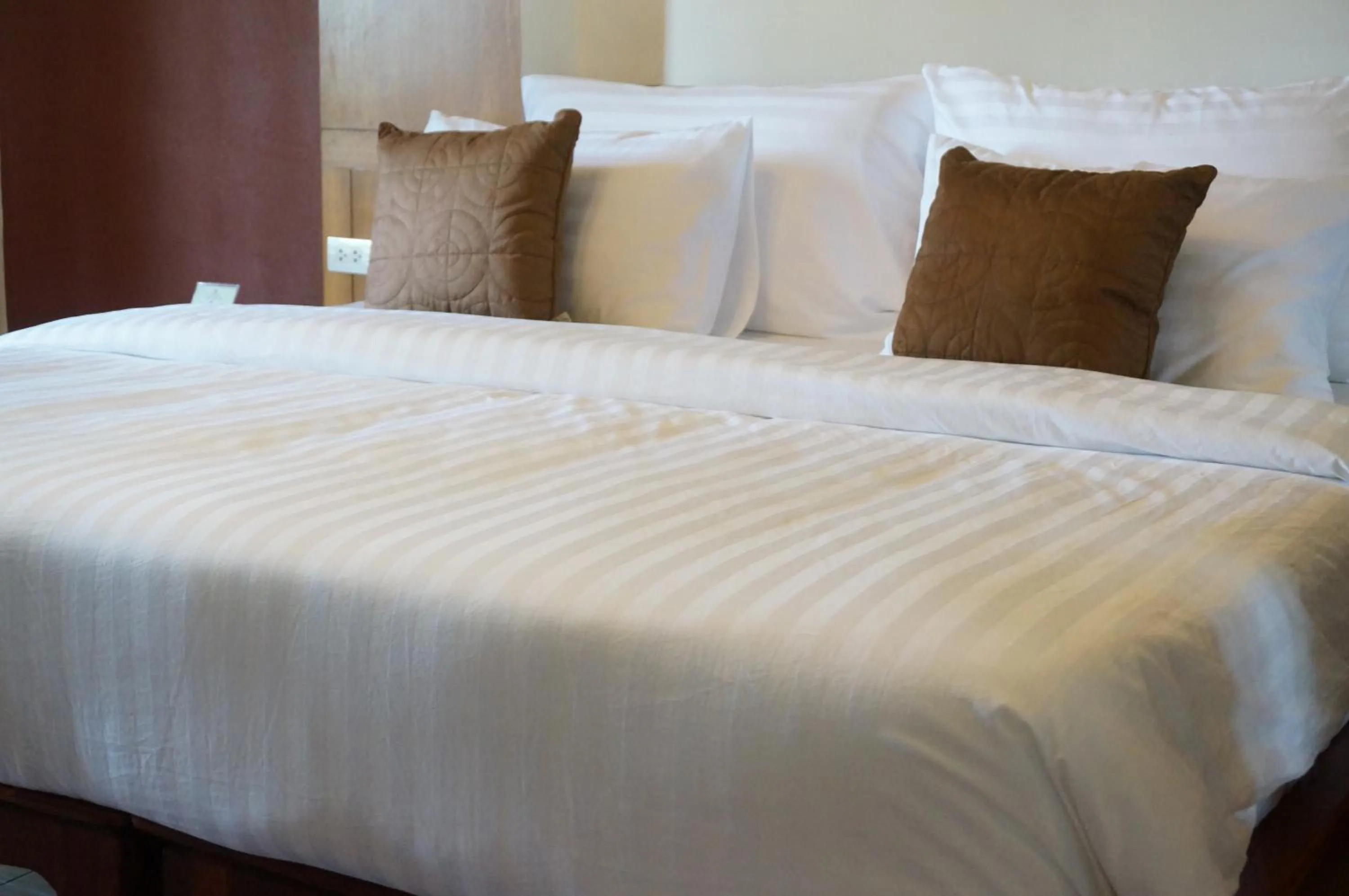 Bed in Country Lake View Hotel