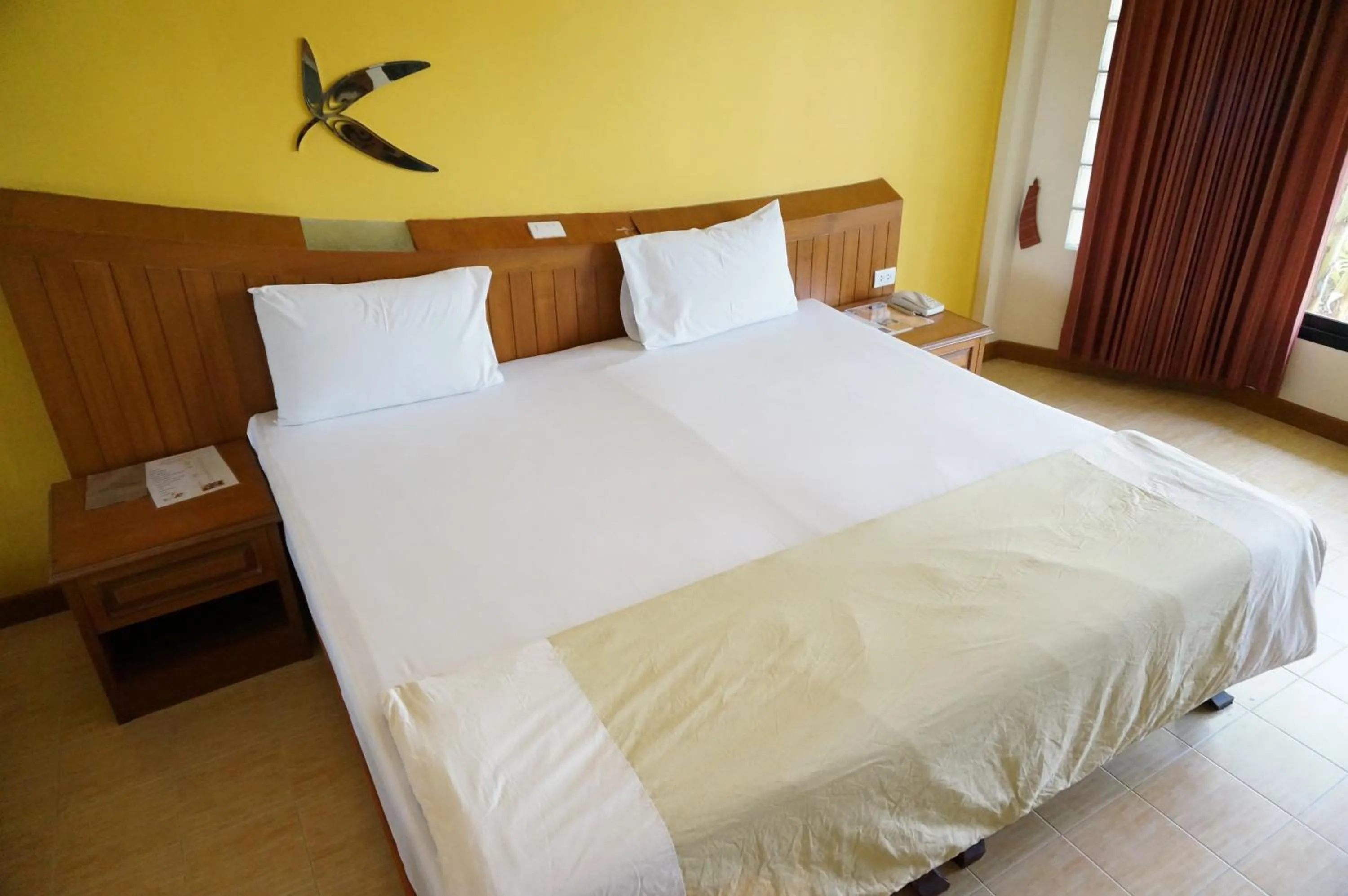 Bed in Country Lake View Hotel