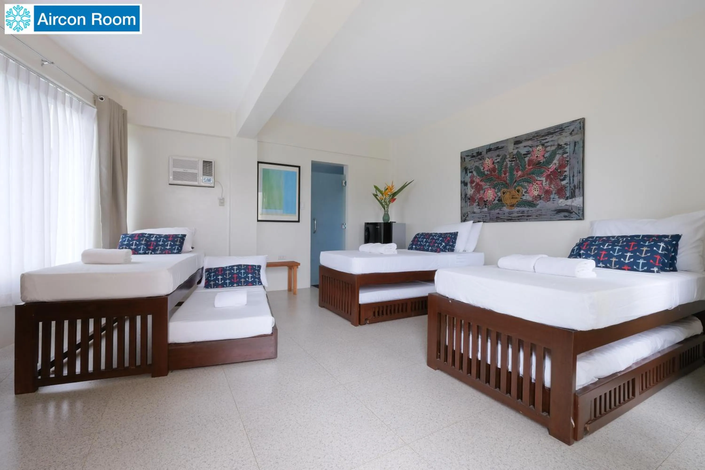 Bed in The Duyan House at Sinagtala Resort