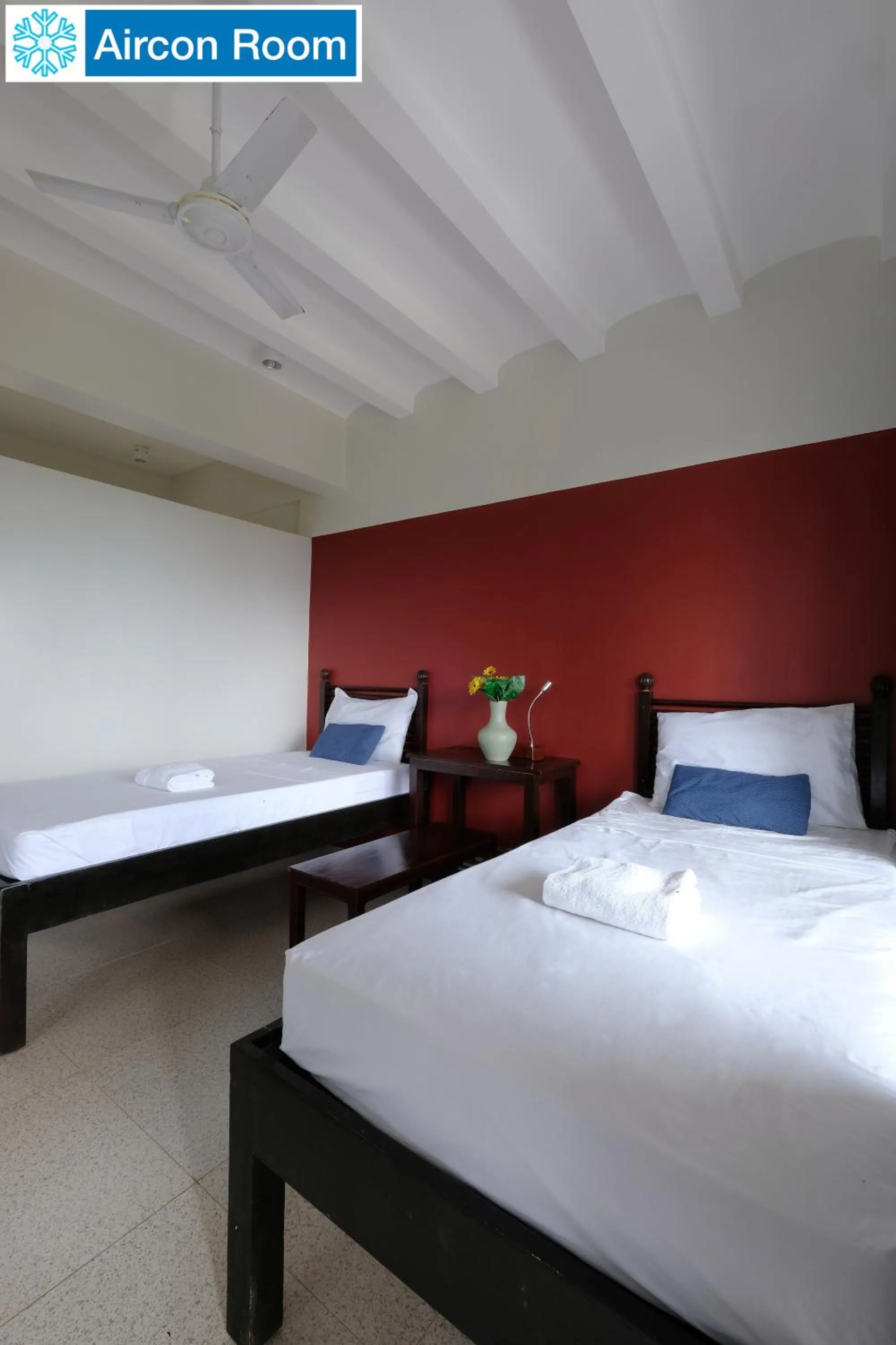 Bed in The Duyan House at Sinagtala Resort