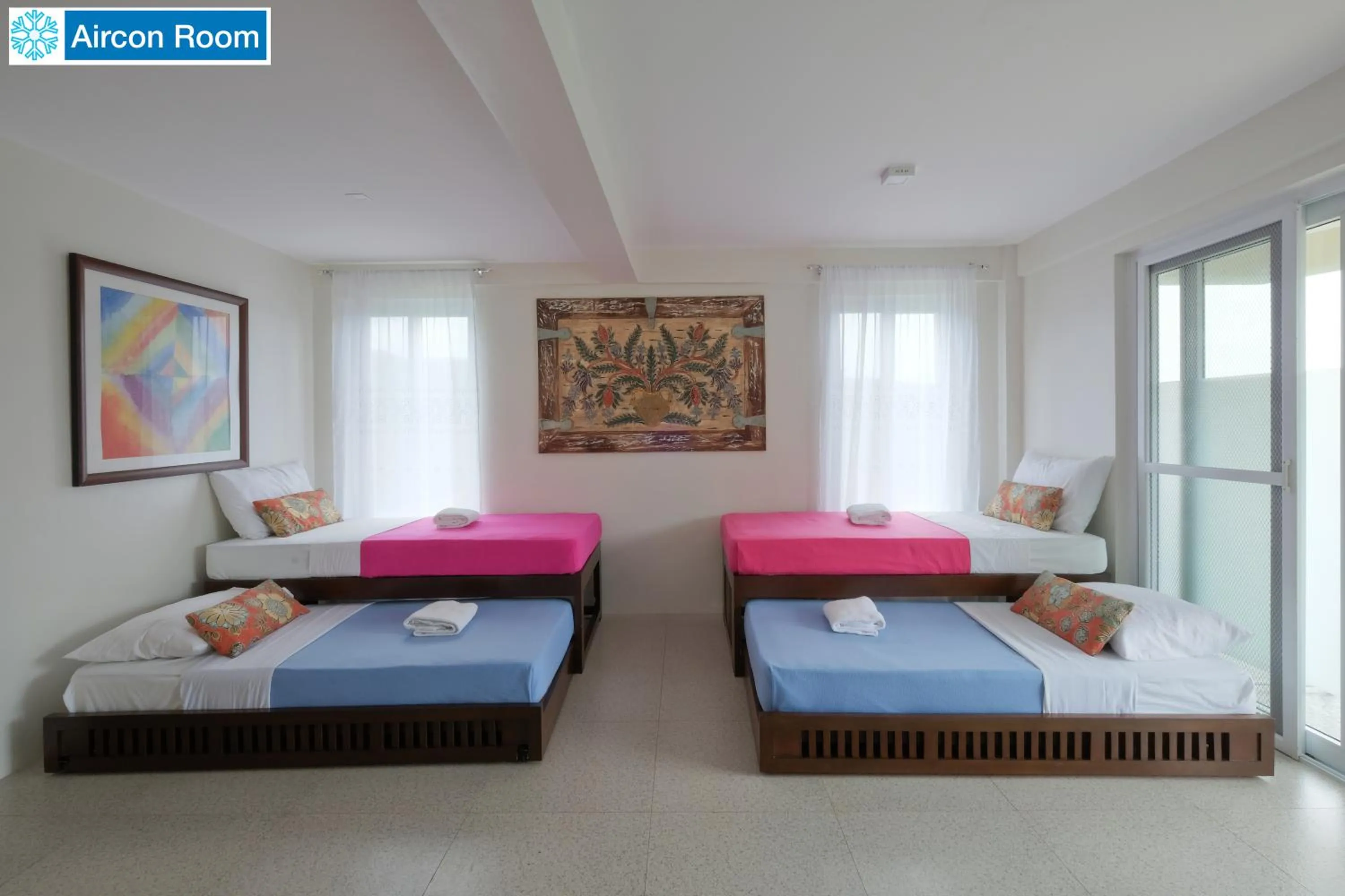 Bed in The Duyan House at Sinagtala Resort