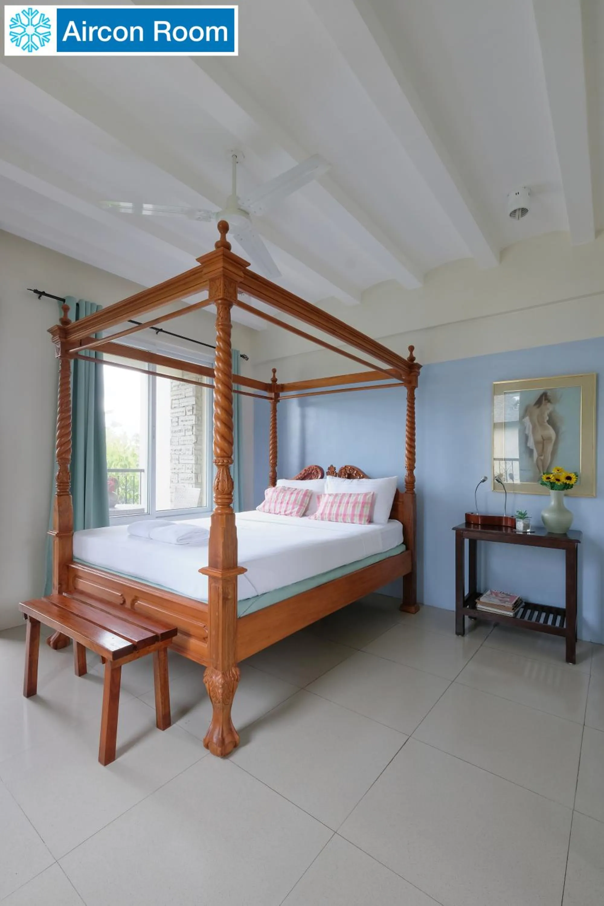 Bed in The Duyan House at Sinagtala Resort