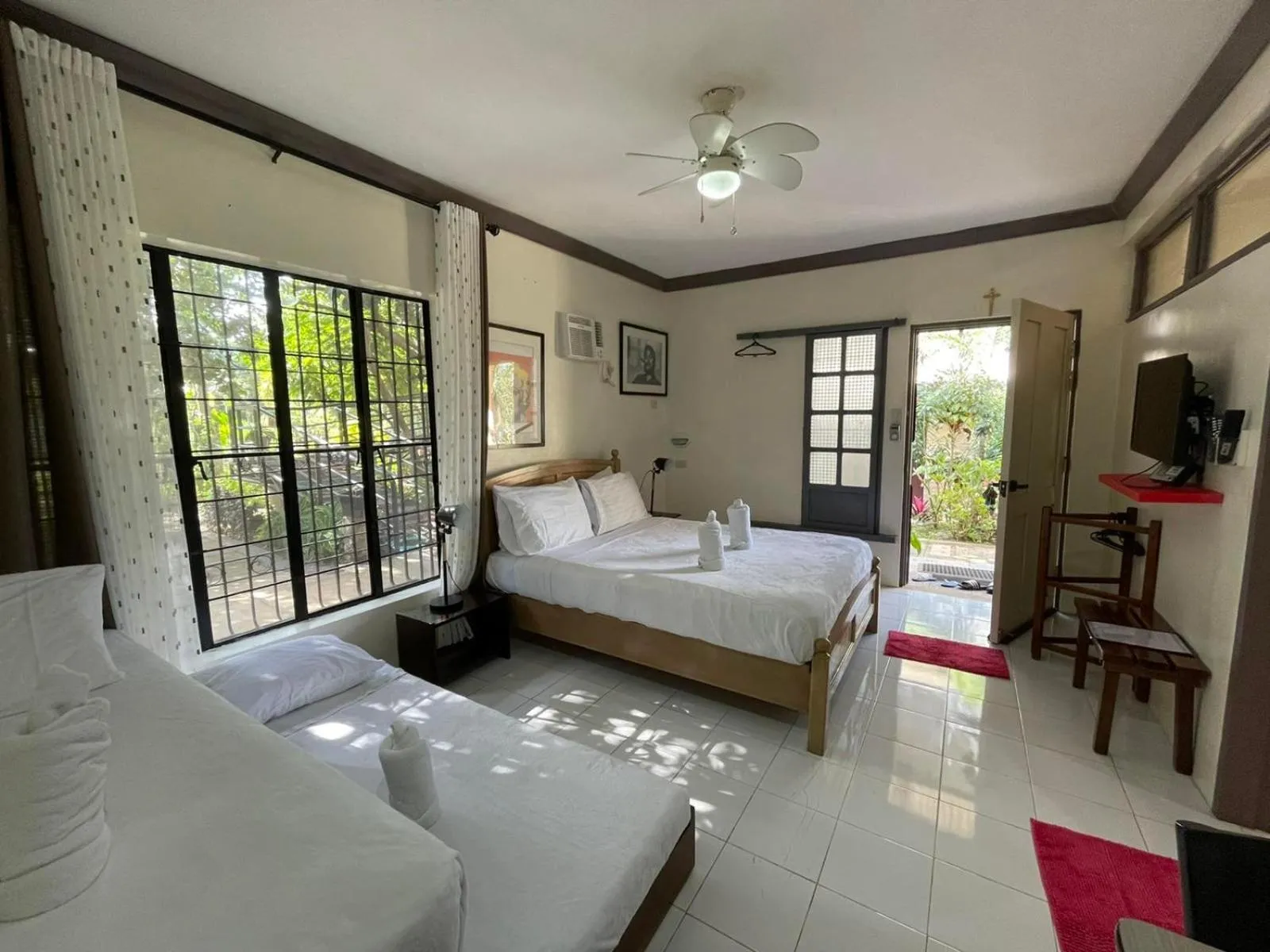 Bed in The Duyan House at Sinagtala Resort