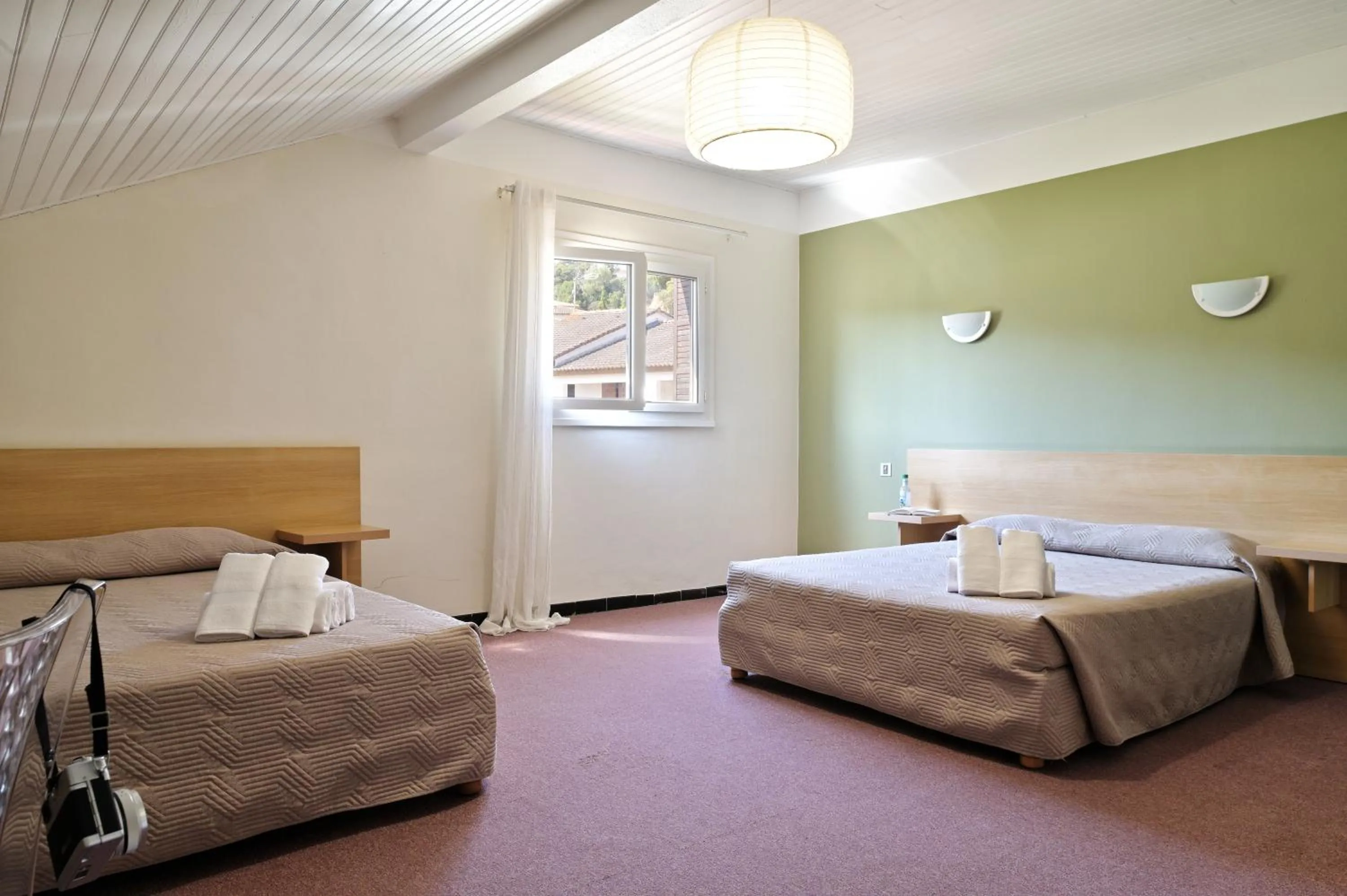 Bed in Hôtel de Porticcio