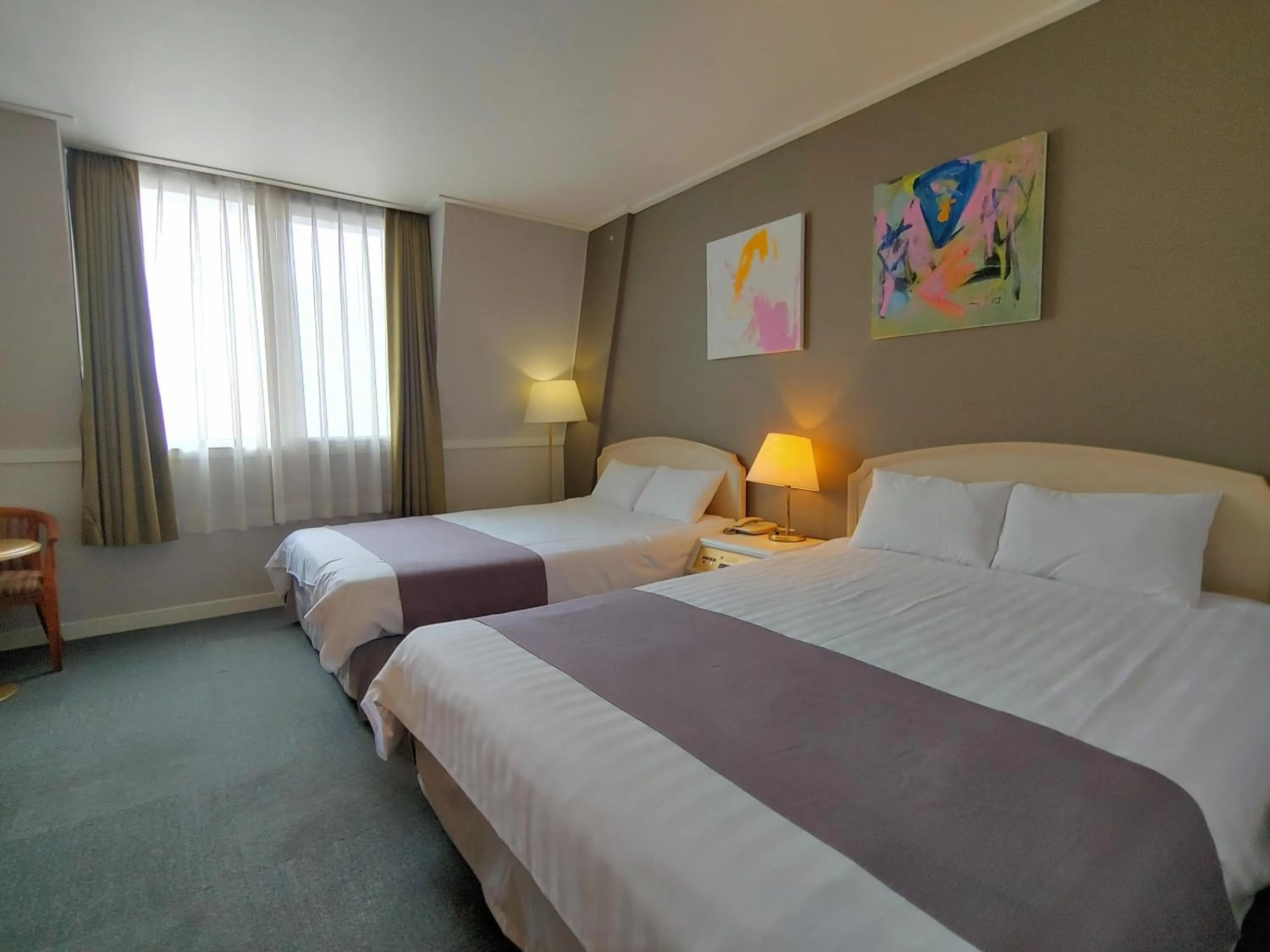 Bed in Pearl Hotel Jeju