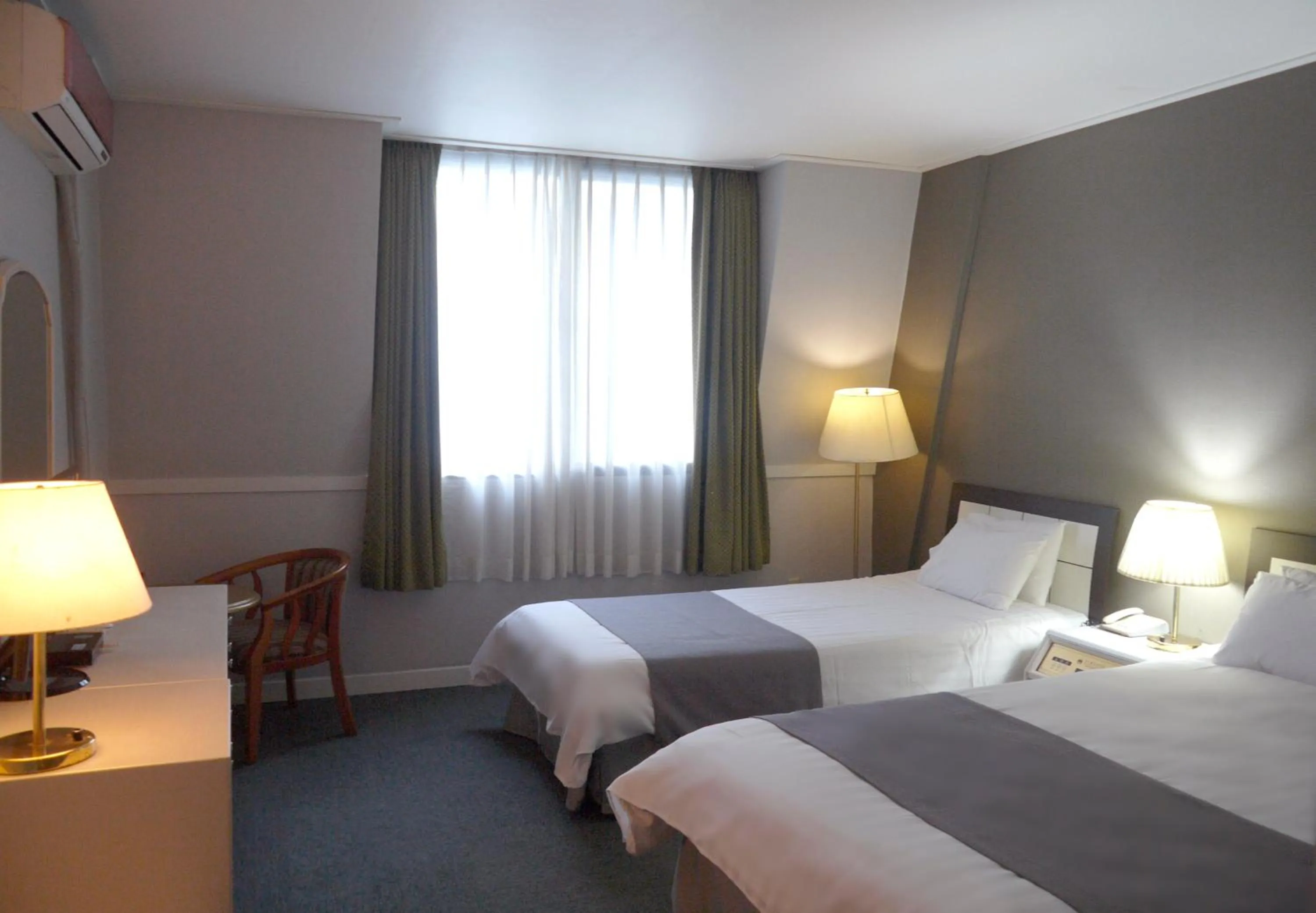 Bed in Pearl Hotel Jeju