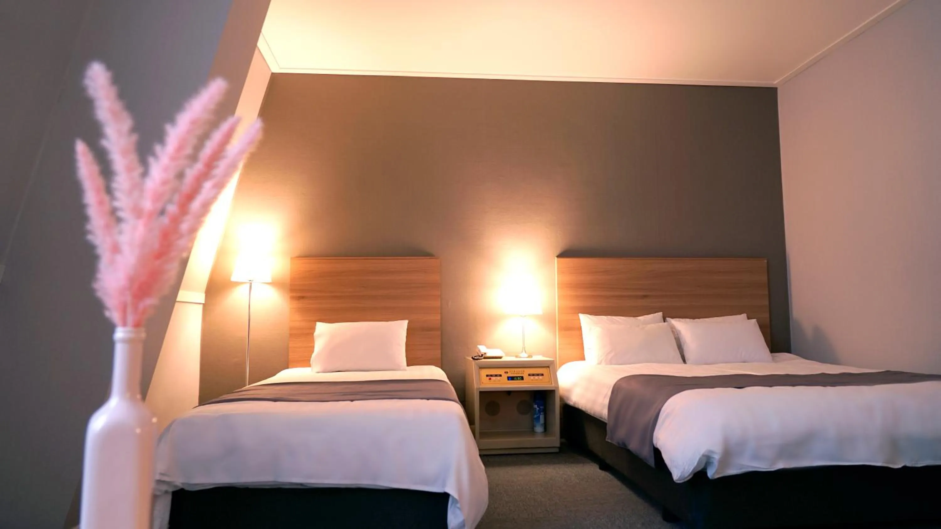 Bed in Pearl Hotel Jeju