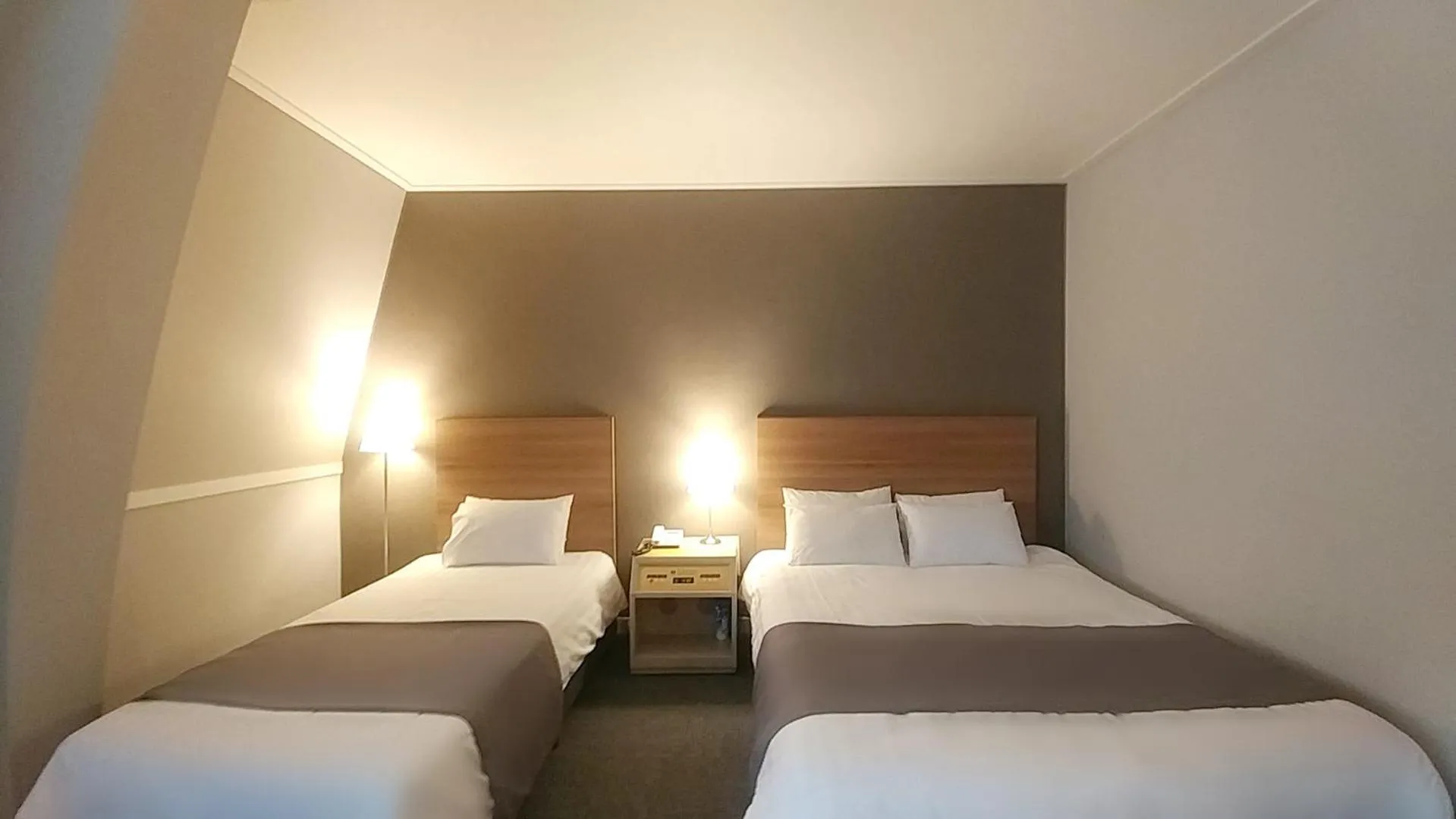 Bed in Pearl Hotel Jeju