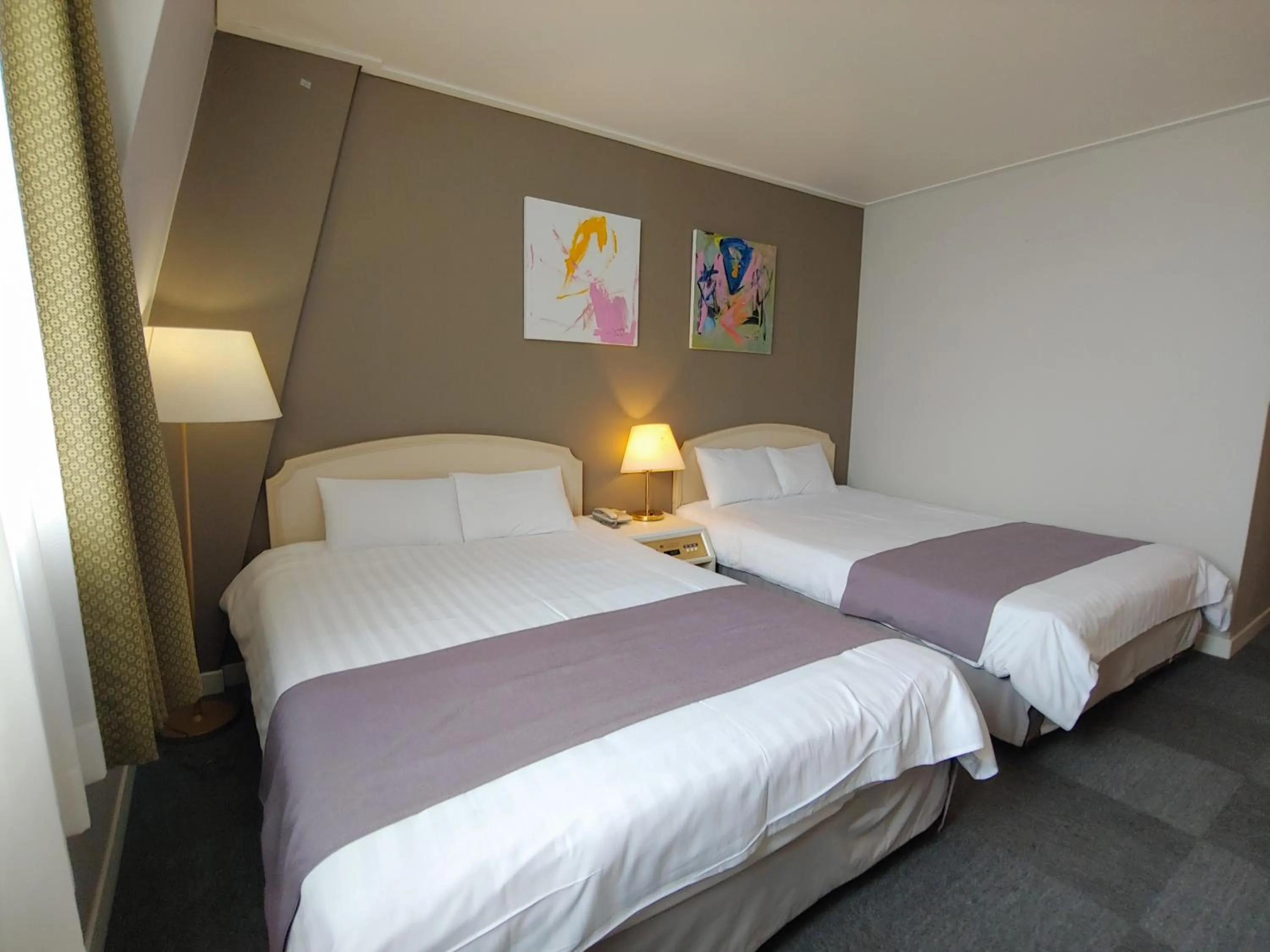 Bed in Pearl Hotel Jeju