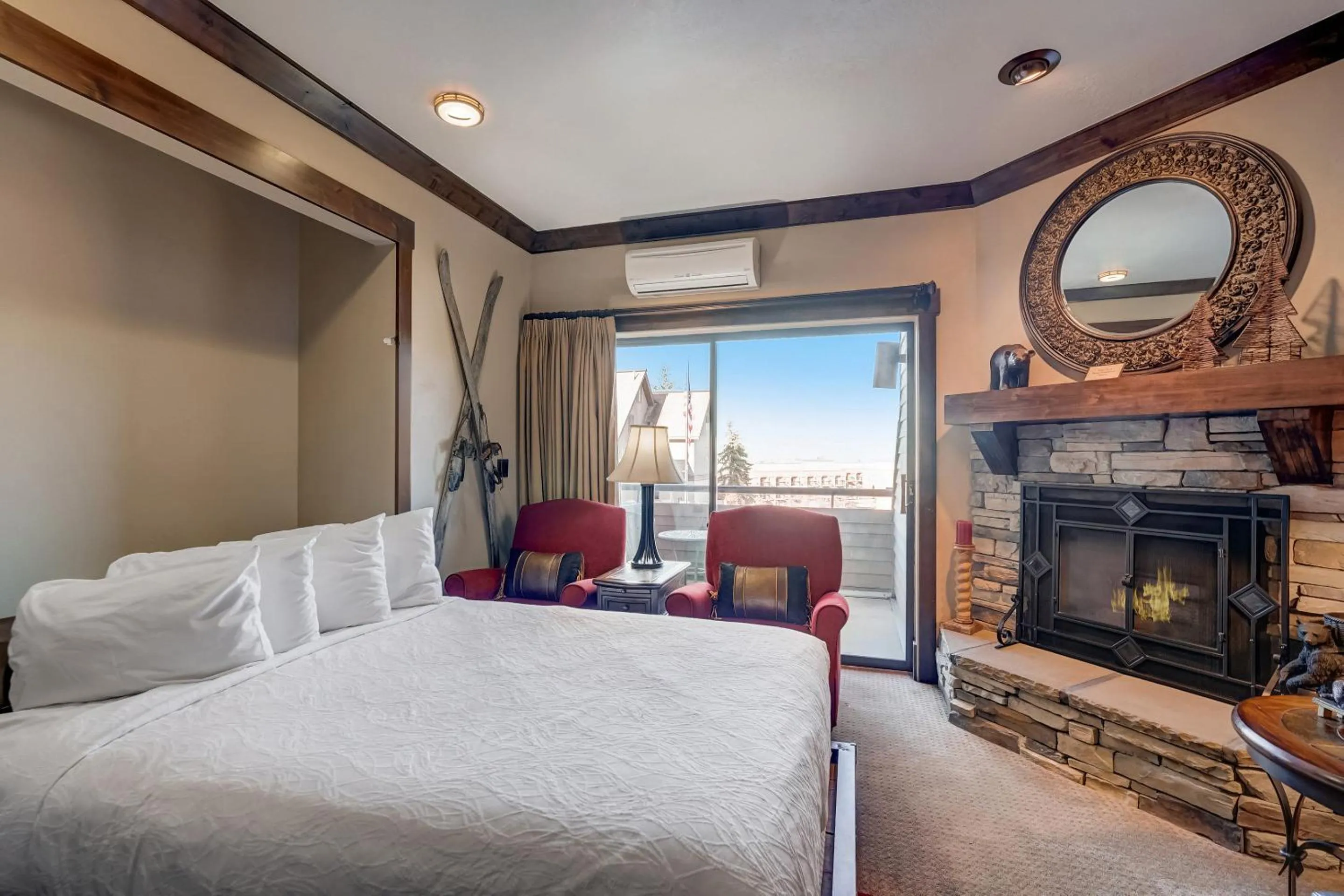 Living room, Bed in The Lodge at the Mountain Village by All Seasons Resort Lodging