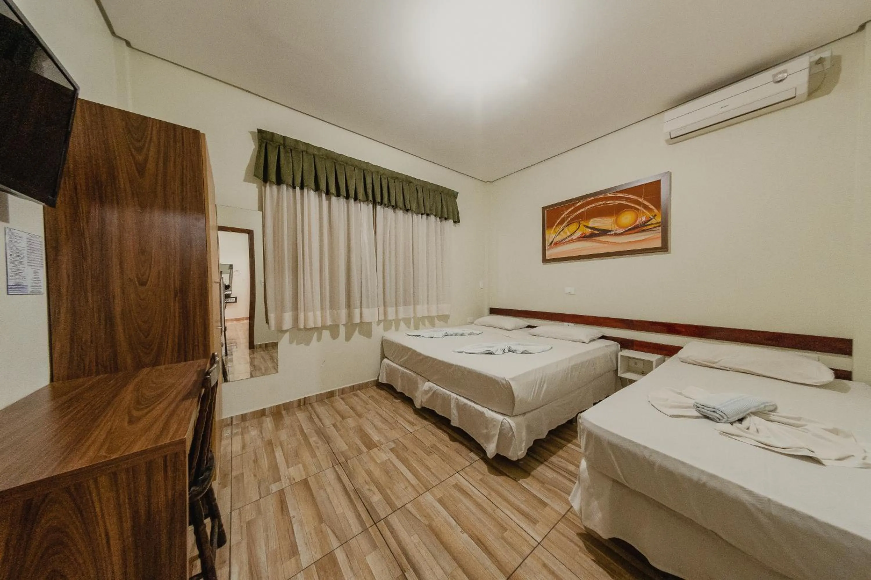 Bed in Hotel e Pousada Caroline