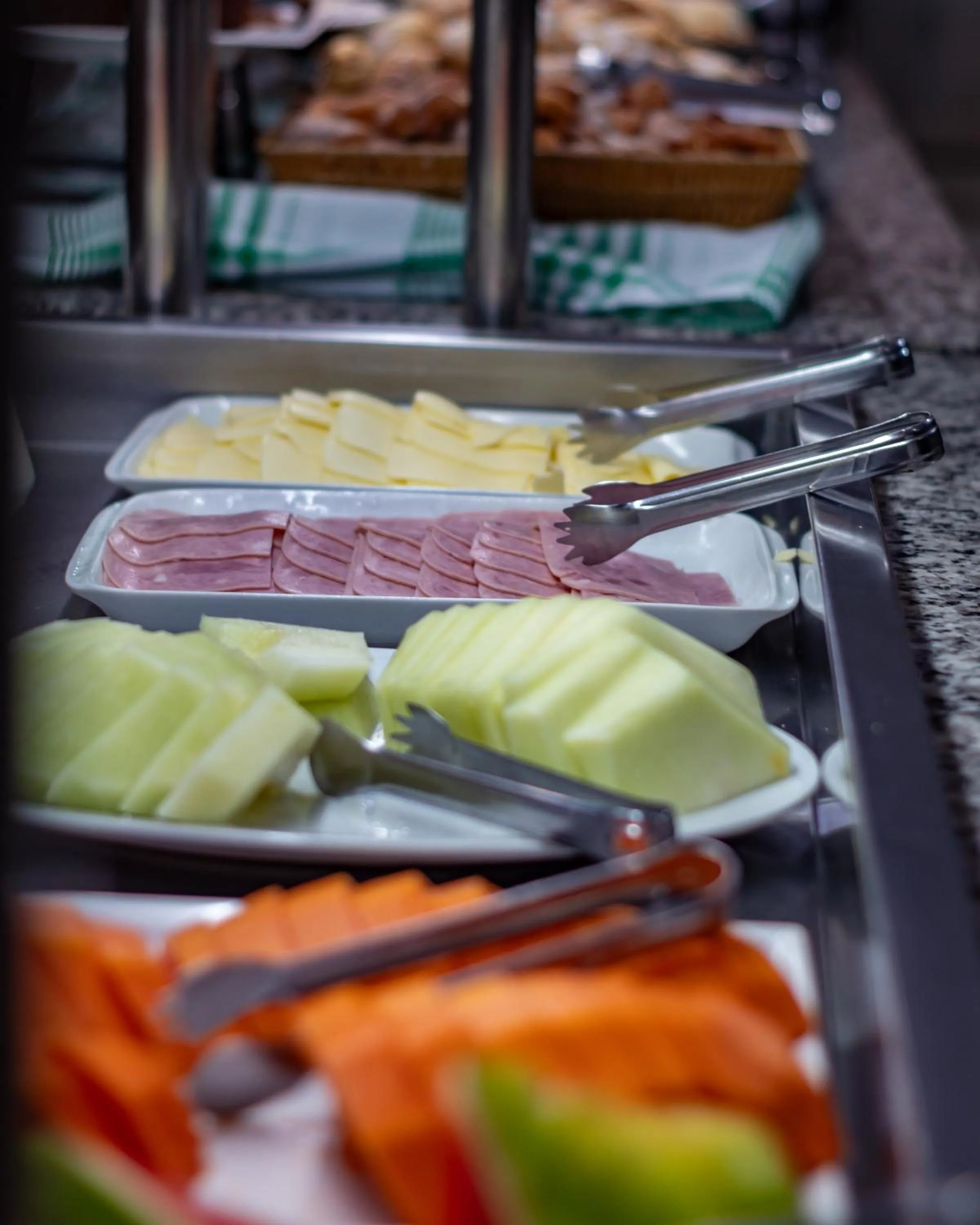 Breakfast in Hotel e Pousada Caroline