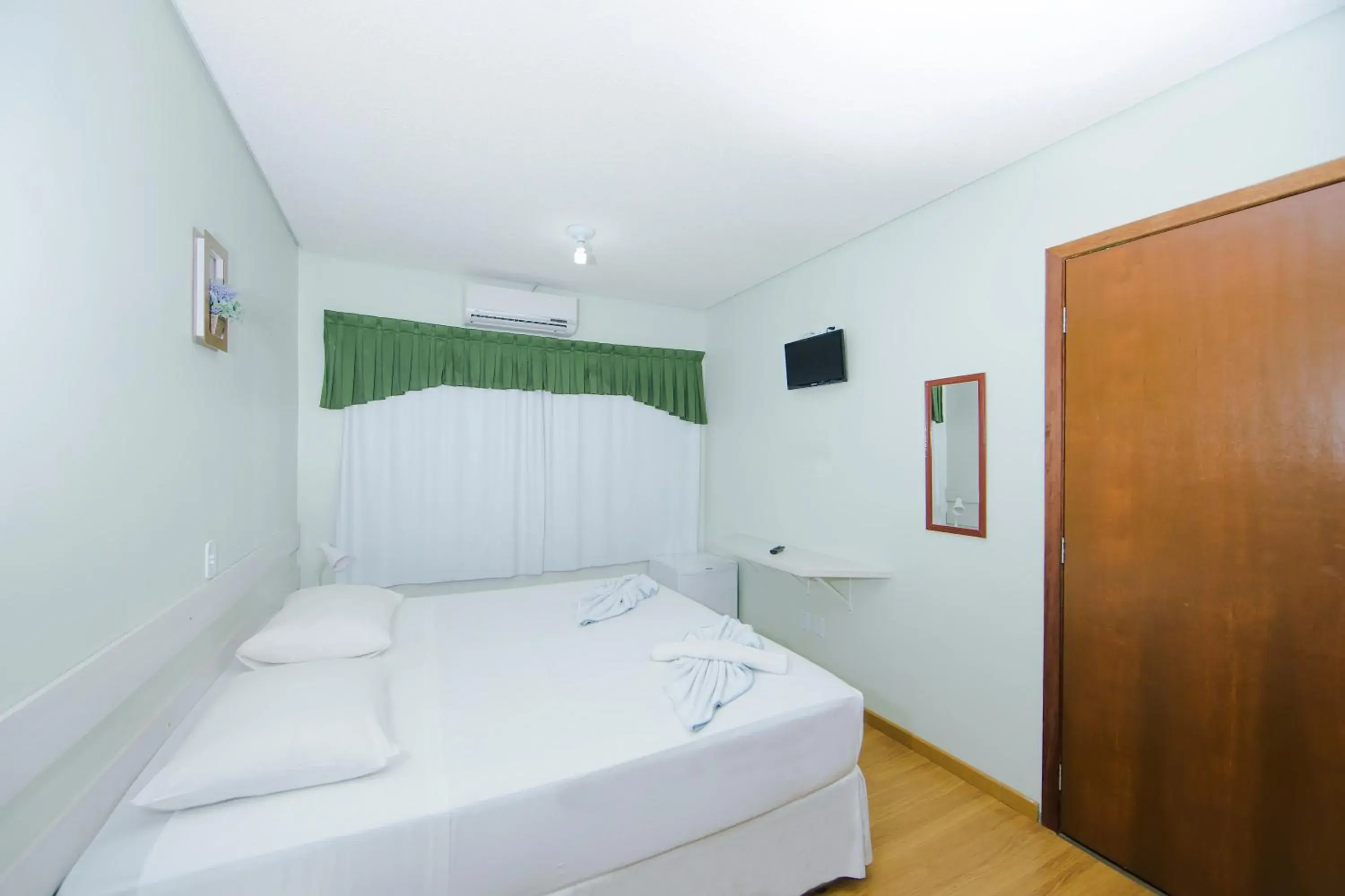 Decorative detail, Bed in Hotel e Pousada Caroline Decorative detail, Bed in Hotel e Pousada Caroline