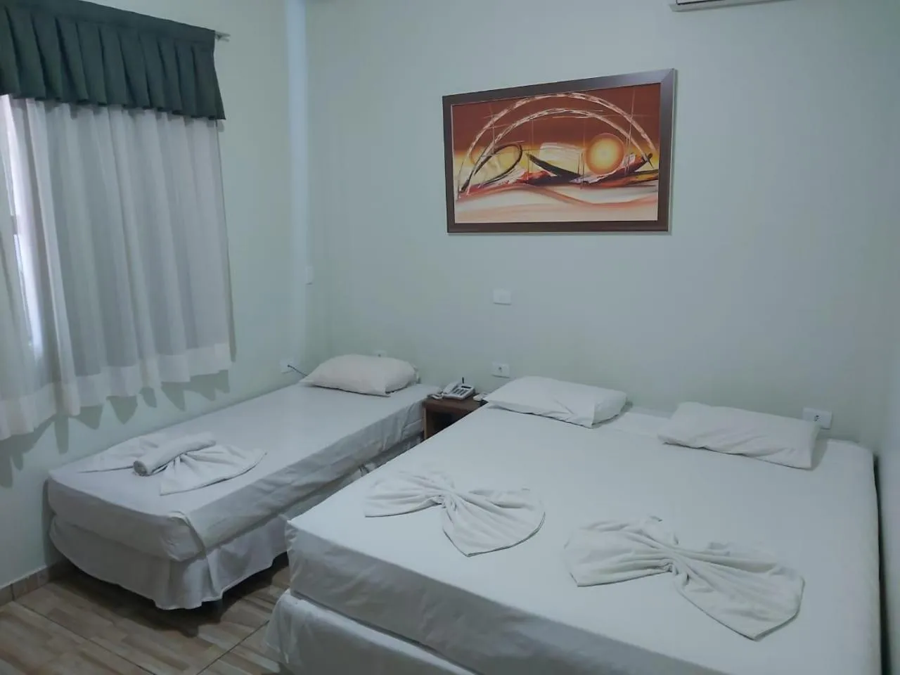 Property building, Bed in Hotel e Pousada Caroline