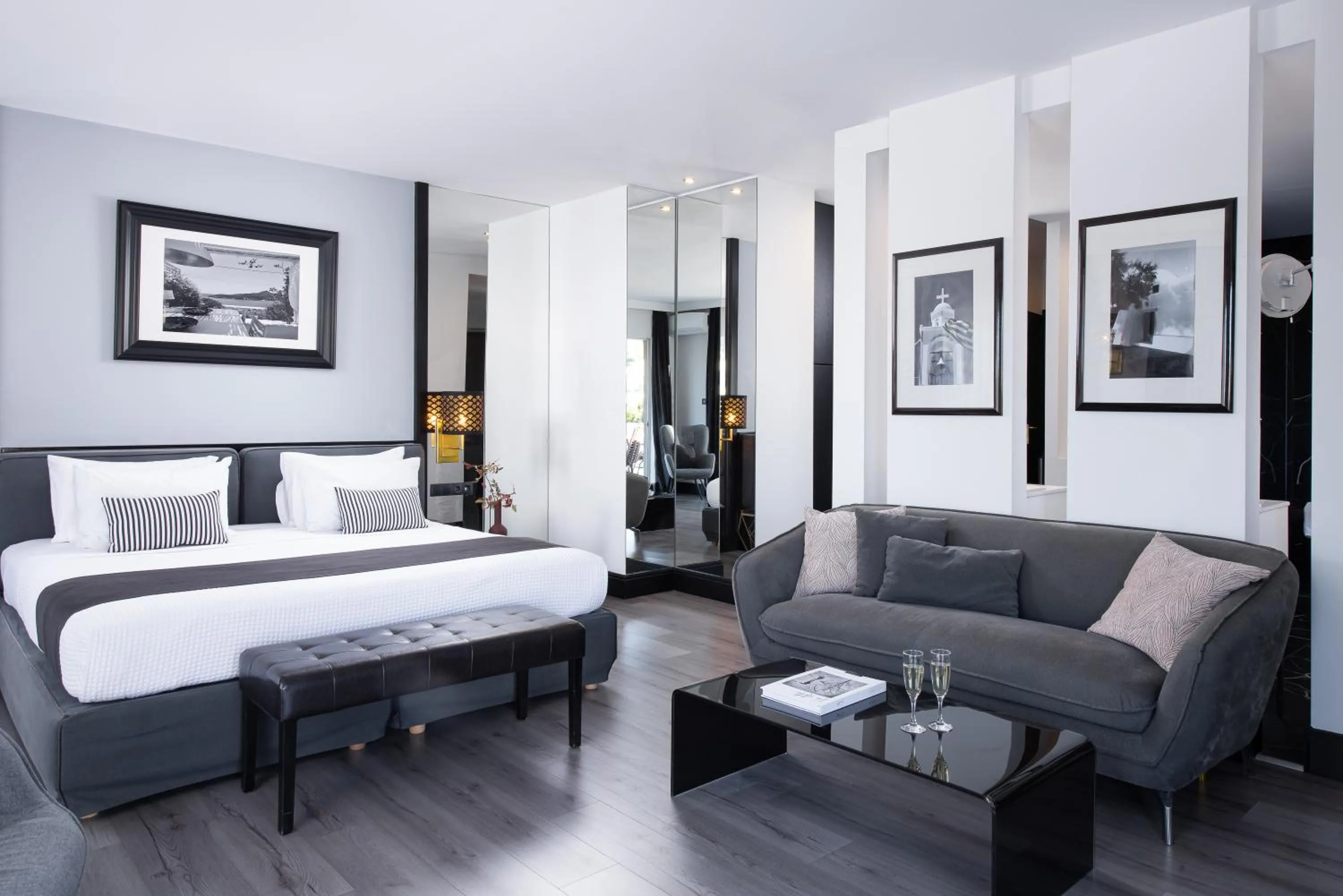 Seating area, Bed in Athenian Riviera Hotel& Suites