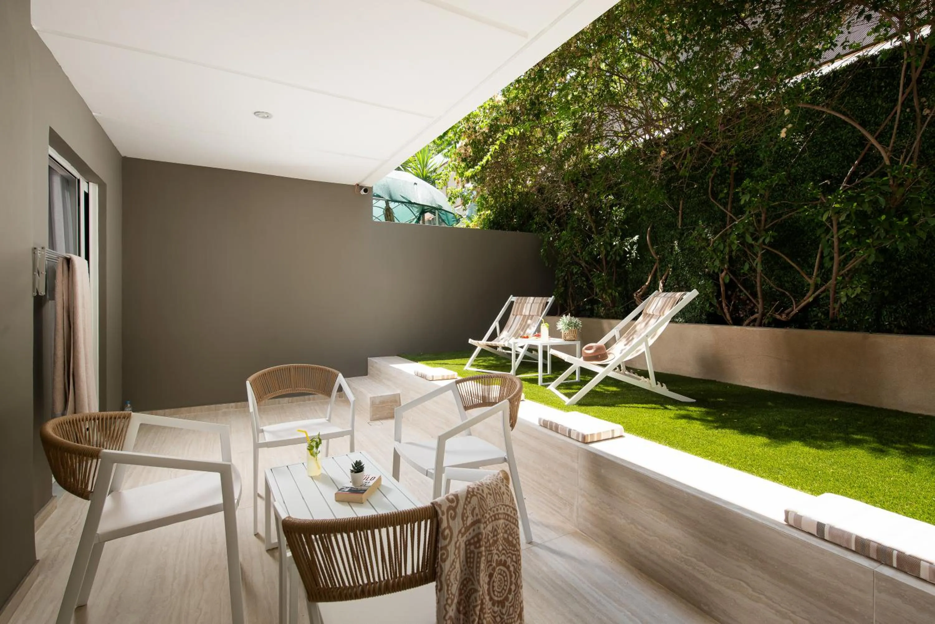 Patio in Athenian Riviera Hotel& Suites