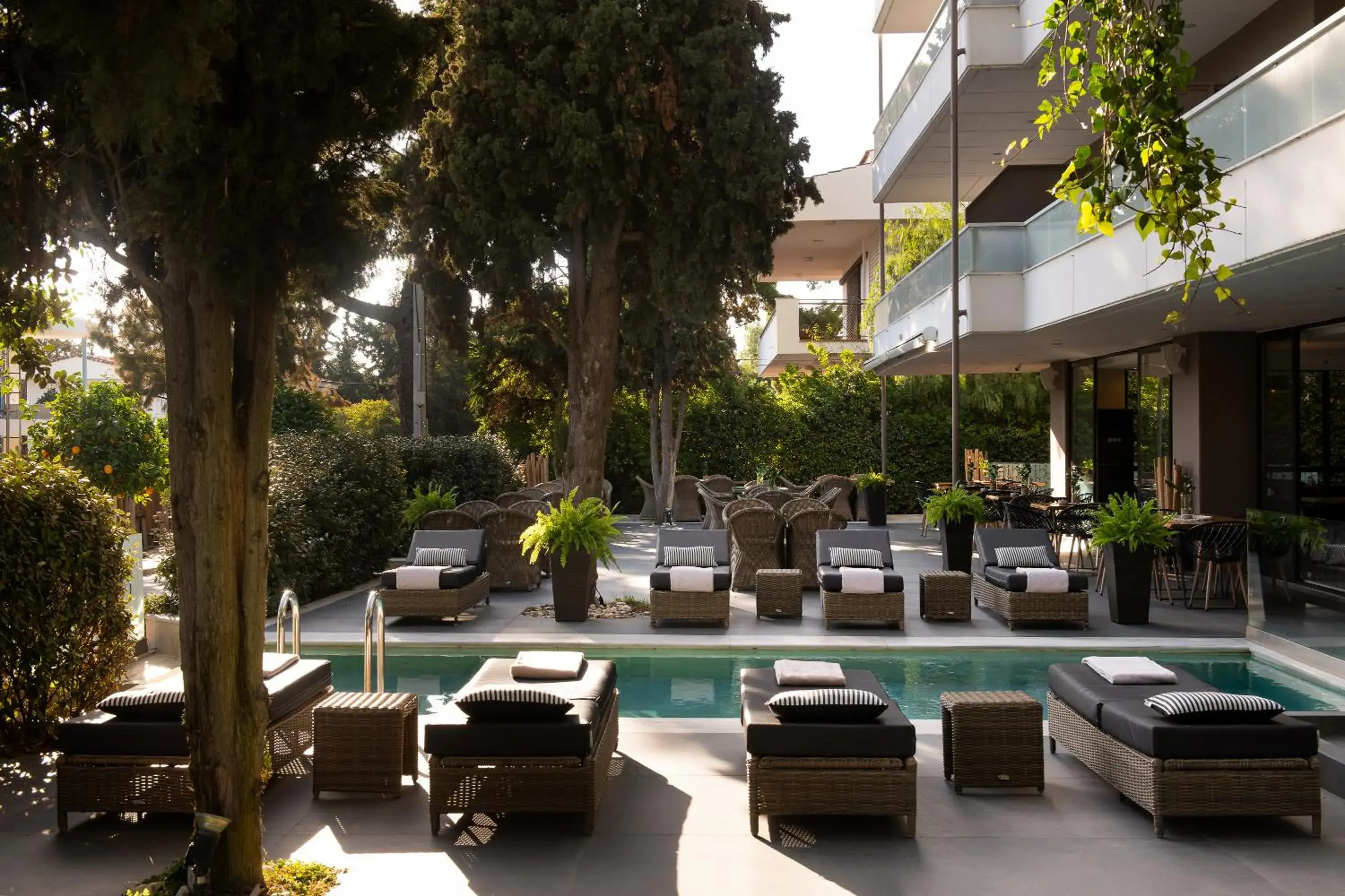 Swimming pool in Athenian Riviera Hotel& Suites Swimming pool in Athenian Riviera Hotel& Suites