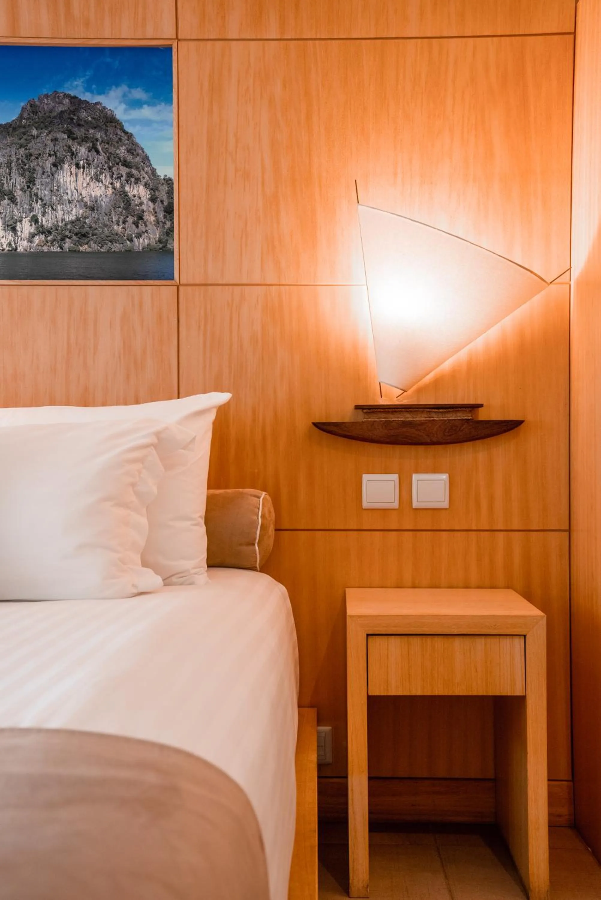 Bed in Hôtel Le Lagon