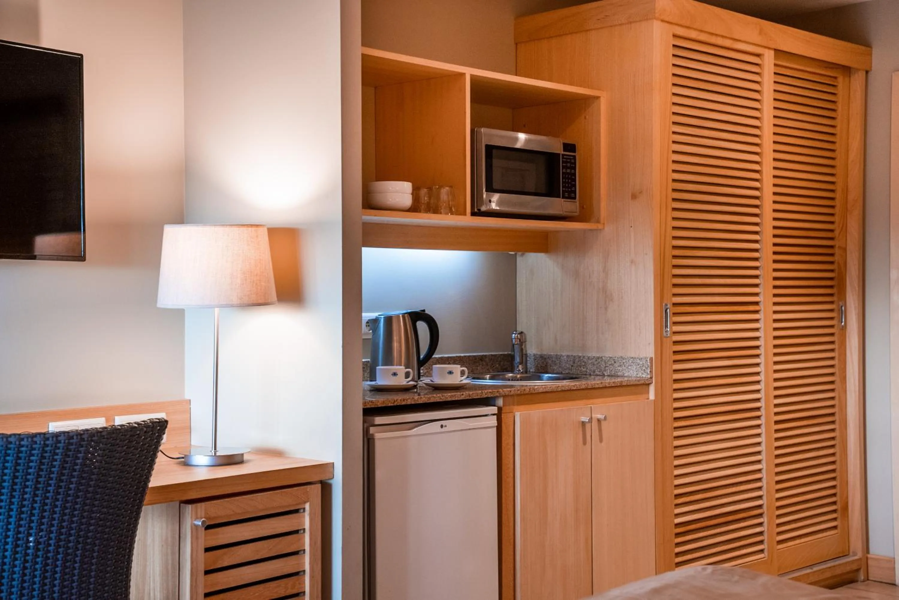 Kitchen or kitchenette in Hôtel Le Lagon