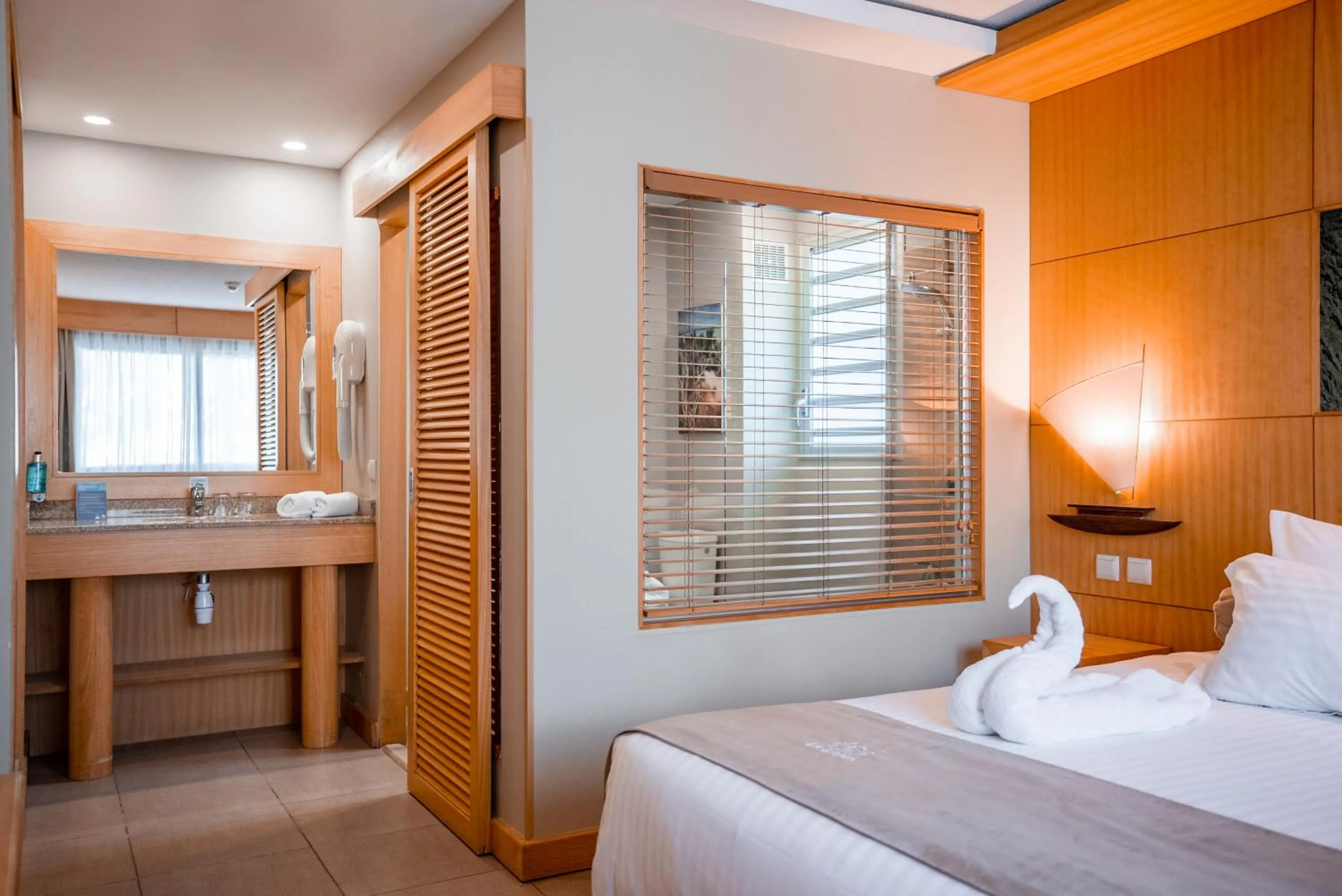 Bed in Hôtel Le Lagon