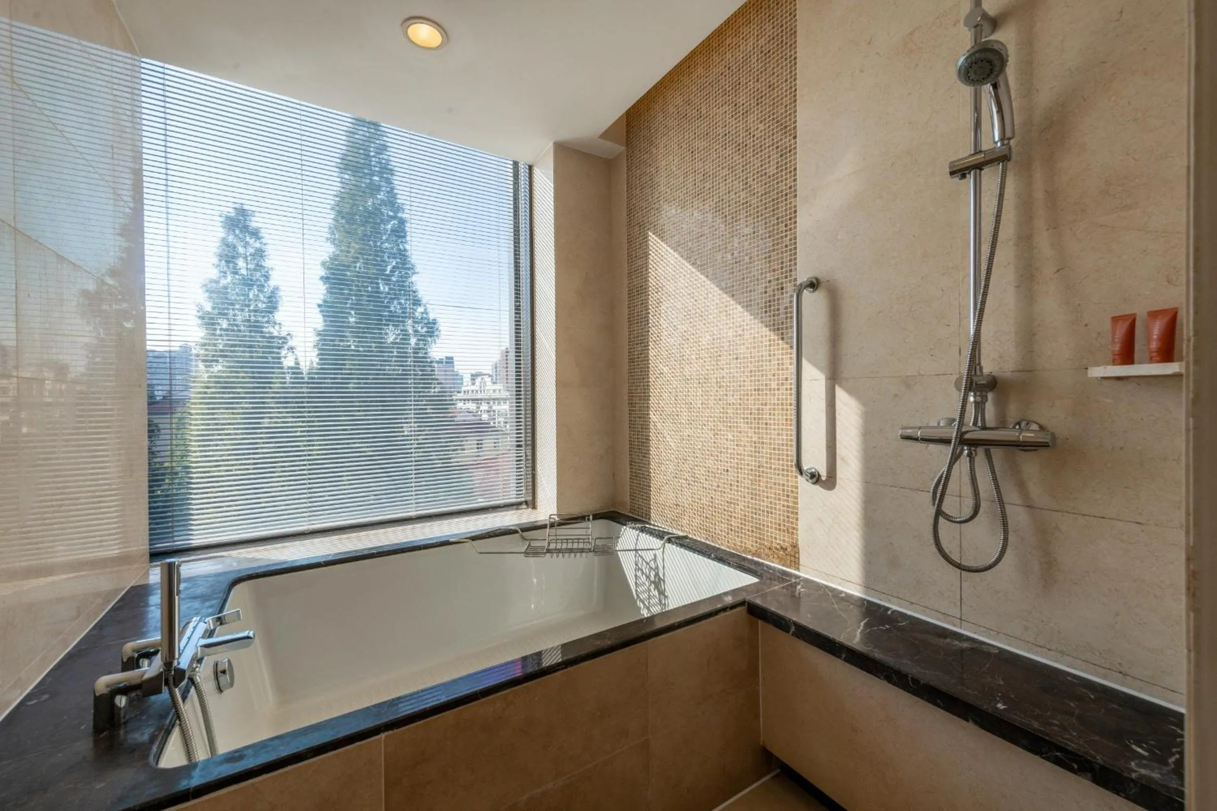 Bathroom in Crowne Plaza Shanghai by IHG