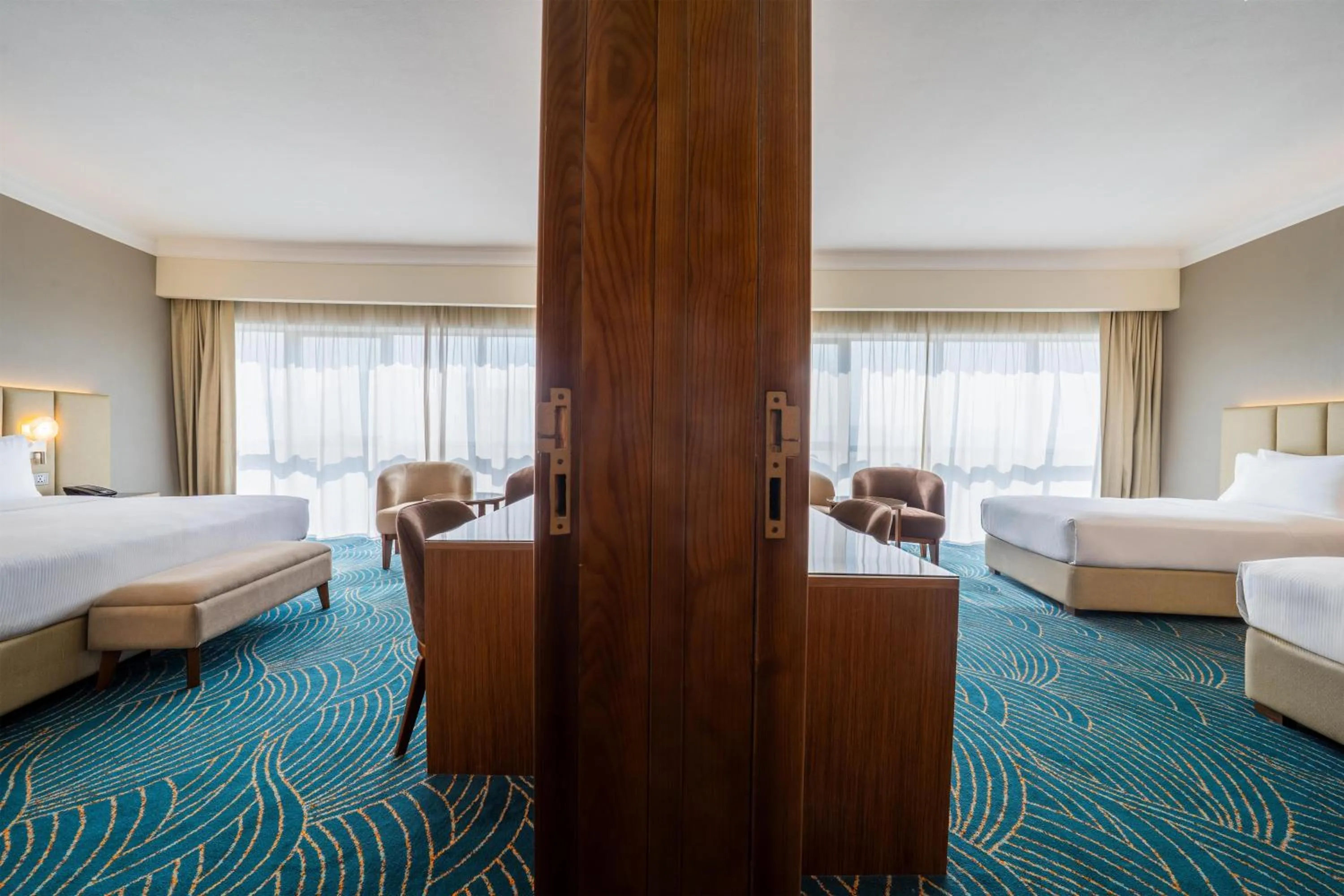 Photo of the whole room, Bed in DoubleTree by Hilton Dubai Port Saeed