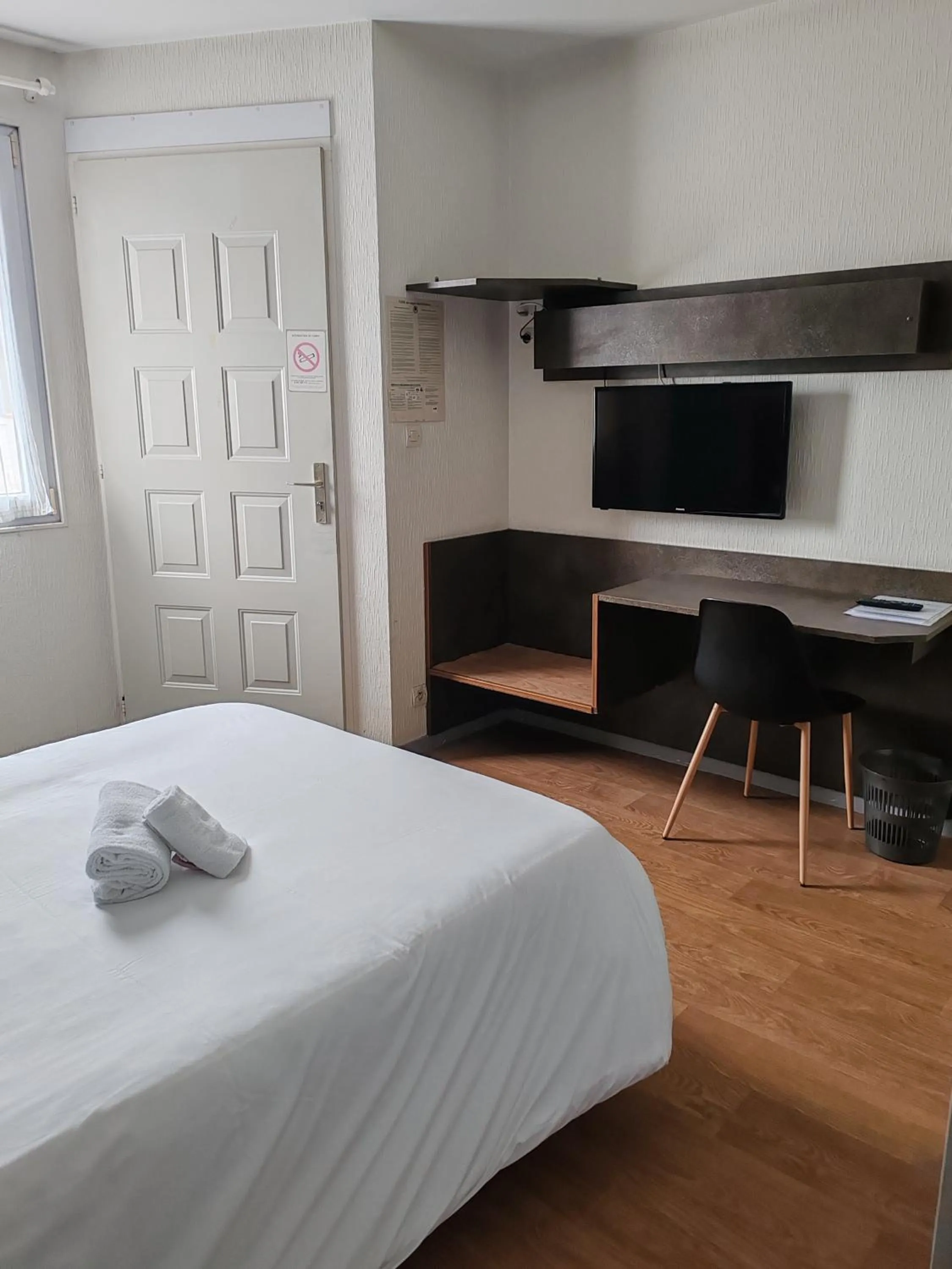 Bed in Hotel Marjolaine