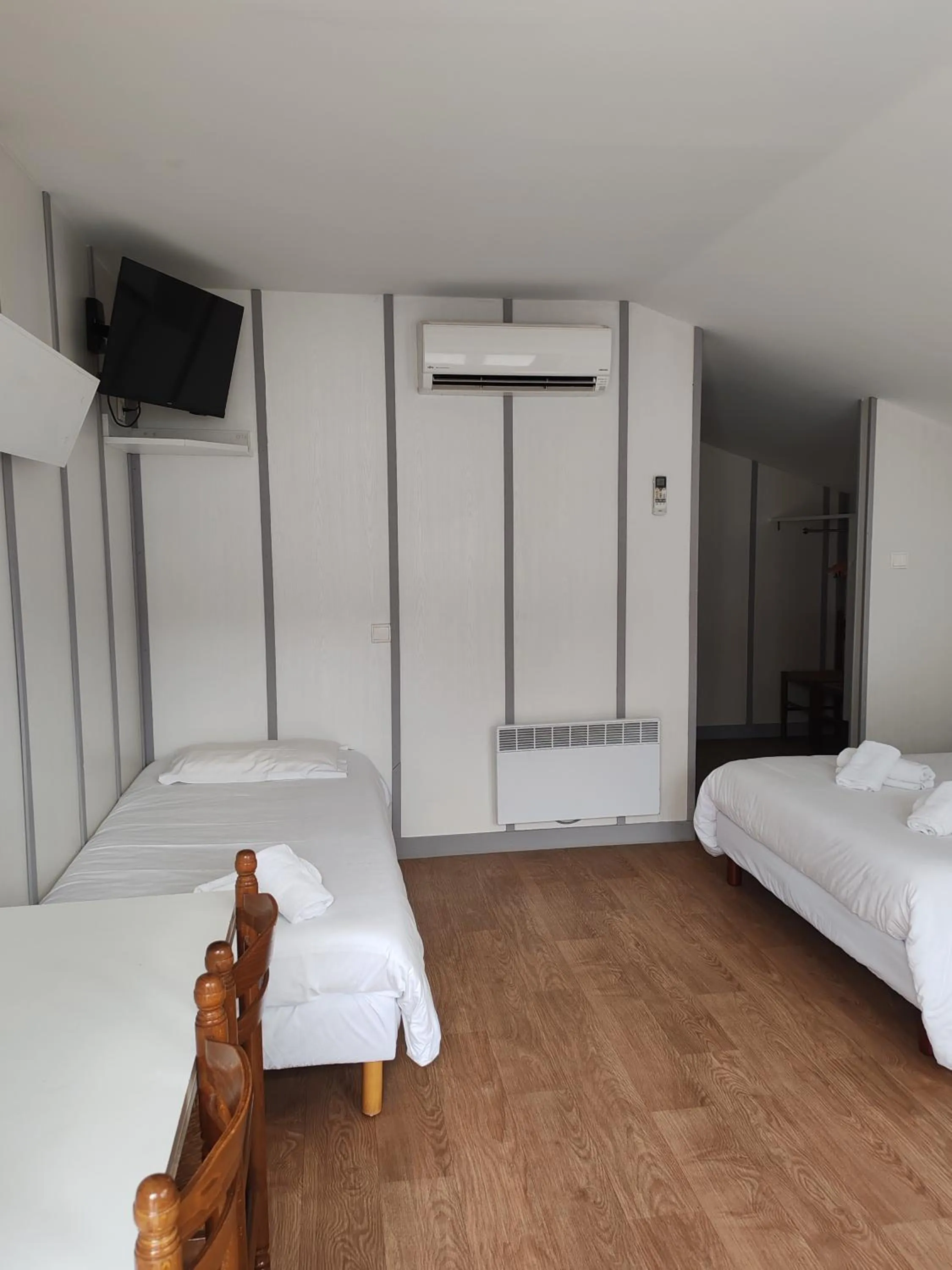 Bed in Hotel Marjolaine