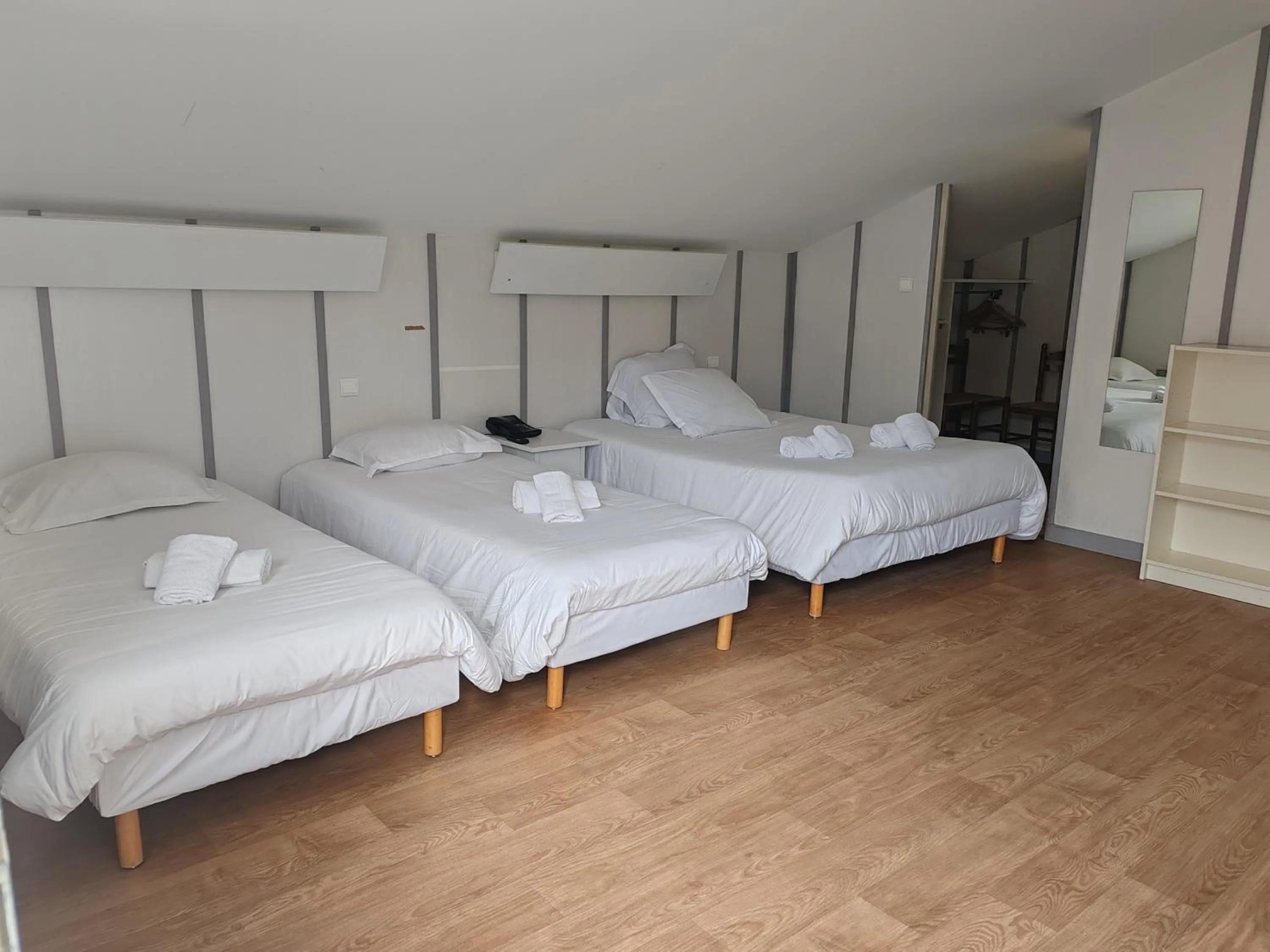 Bed in Hotel Marjolaine