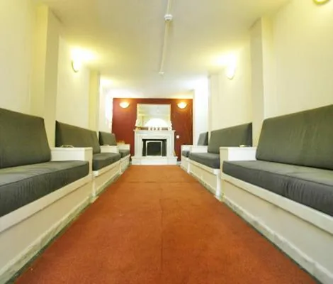 Seating area, Bed in Ilis Hotel