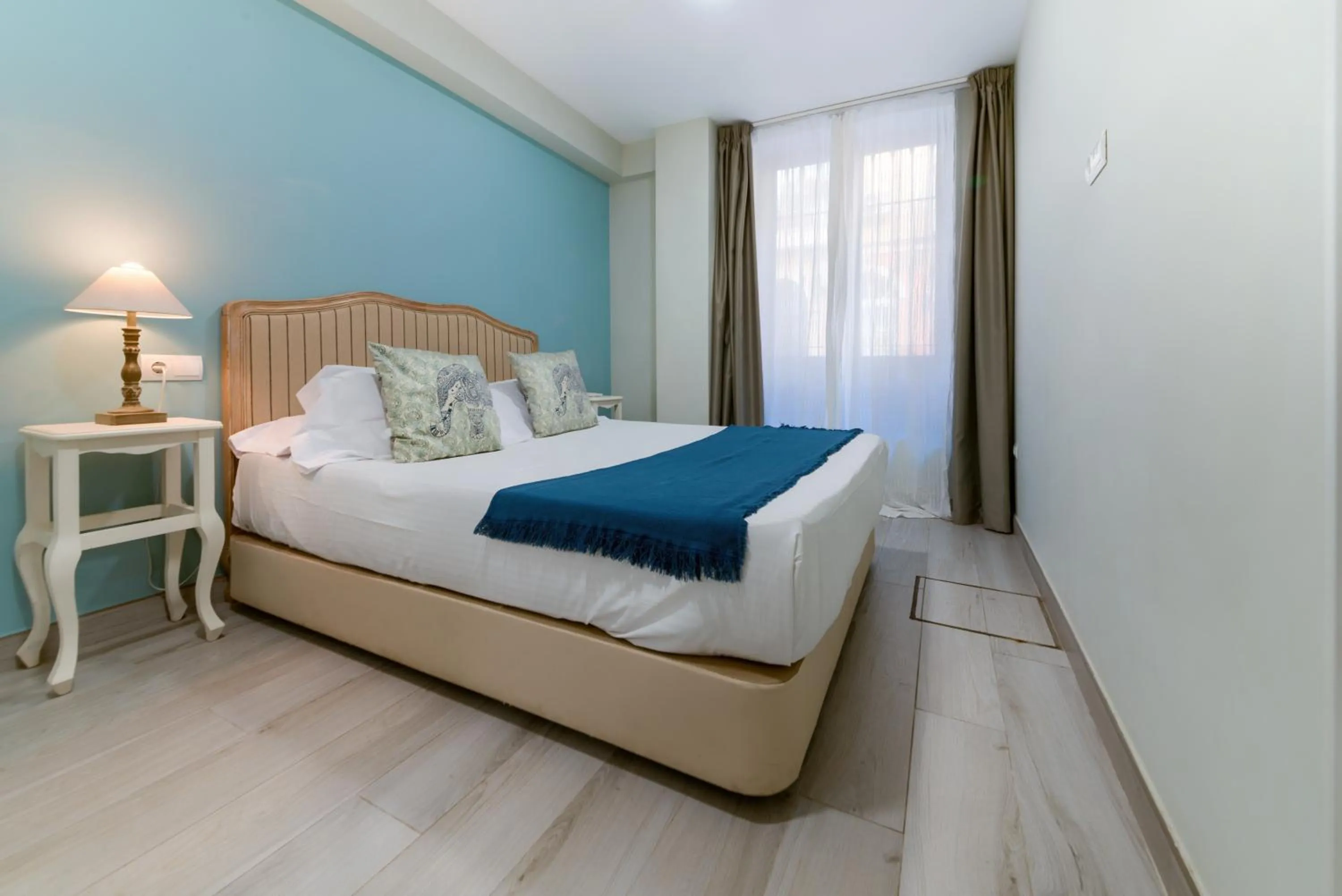 Bed in Holidays2Malaga Suites