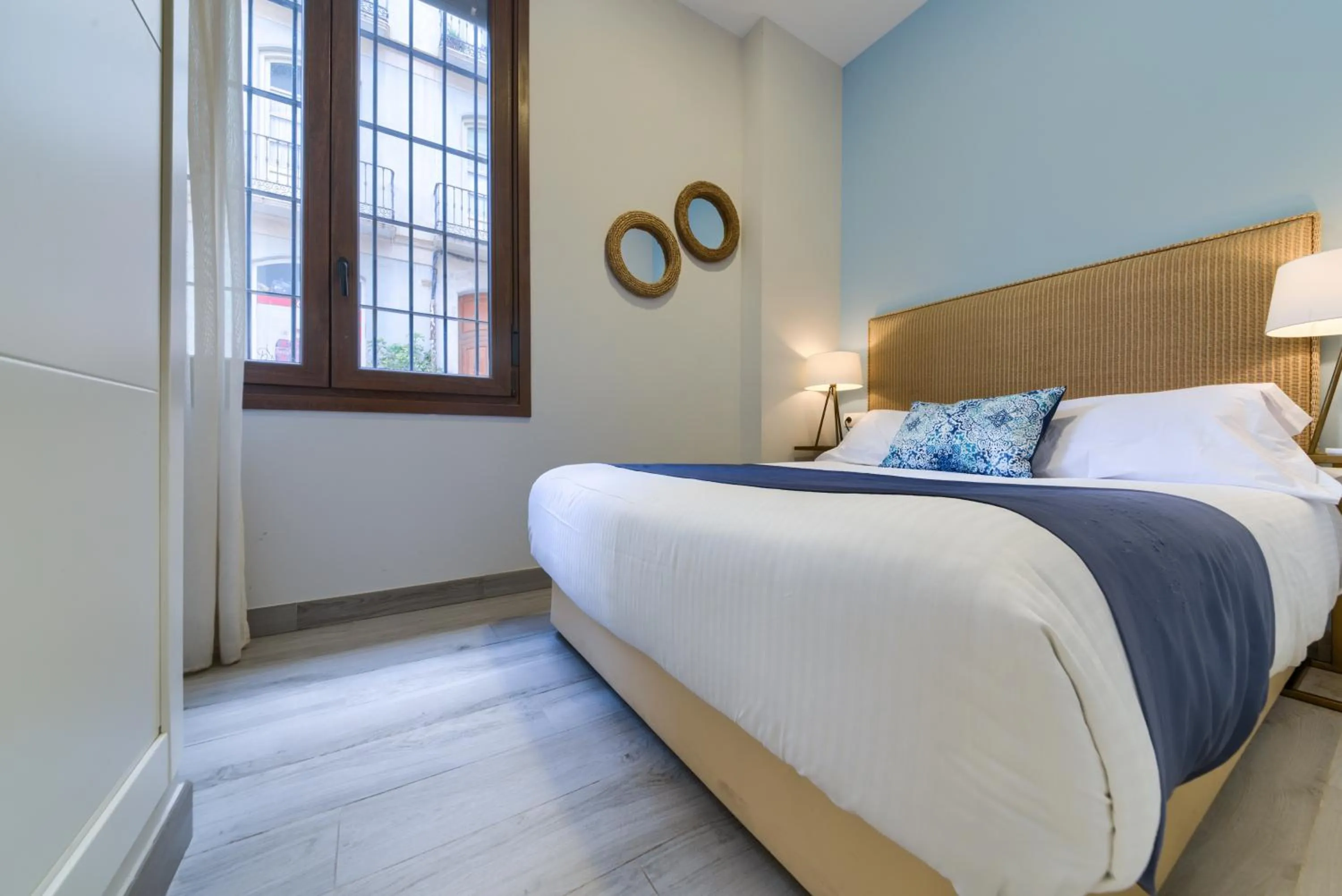 Bed in Holidays2Malaga Suites