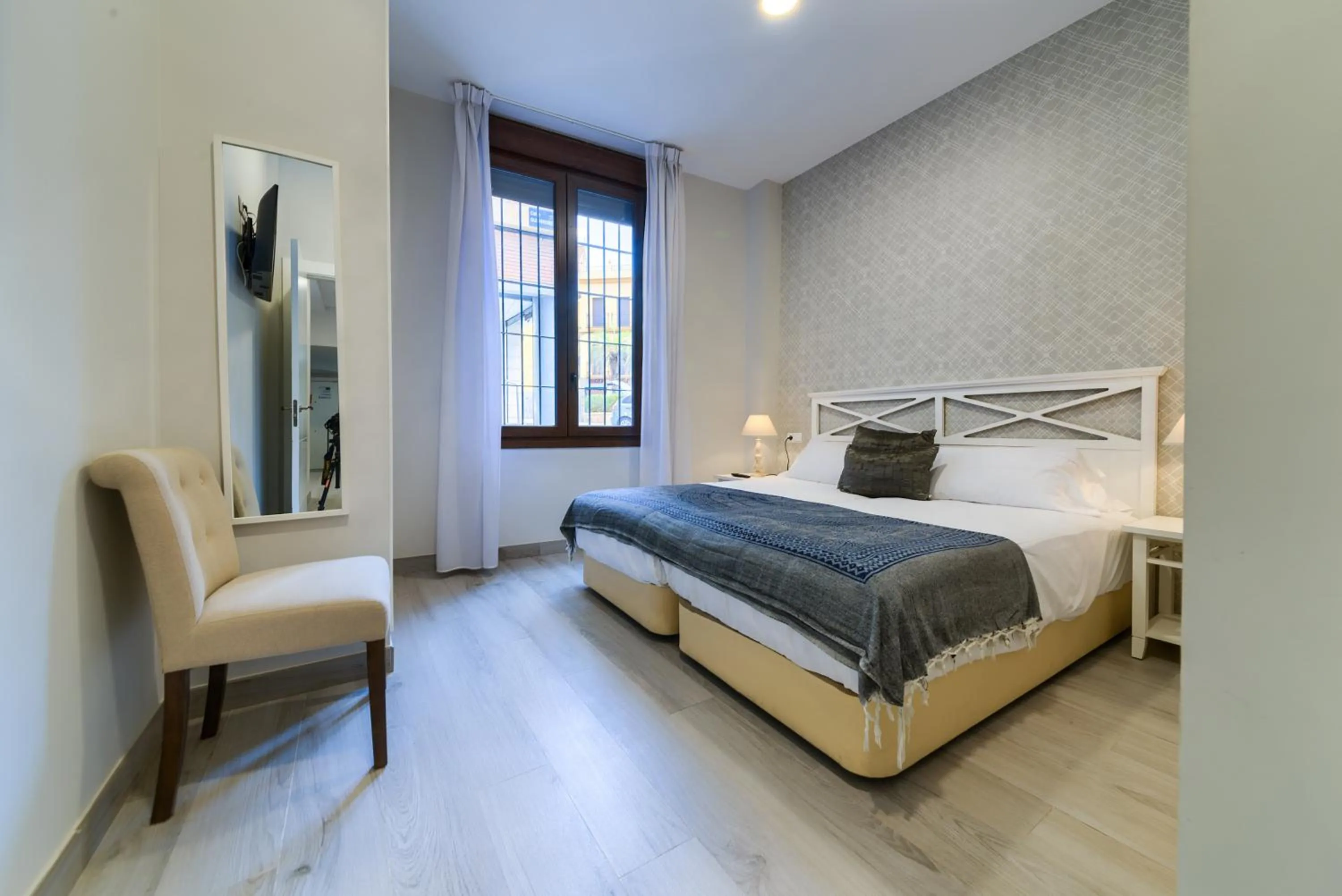 Bed in Holidays2Malaga Suites