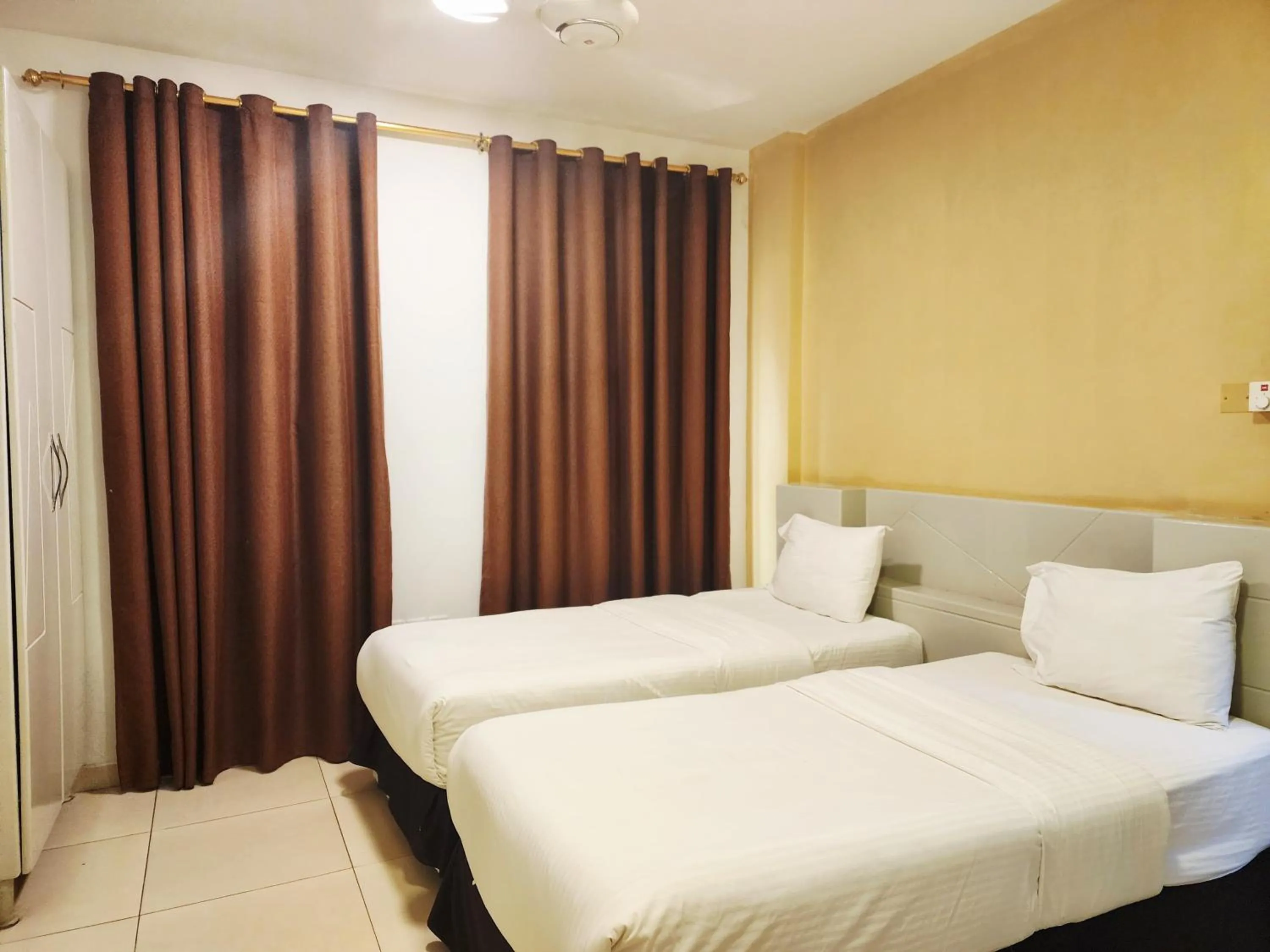 Bed in Star Emirates Inn Hotel Salalah