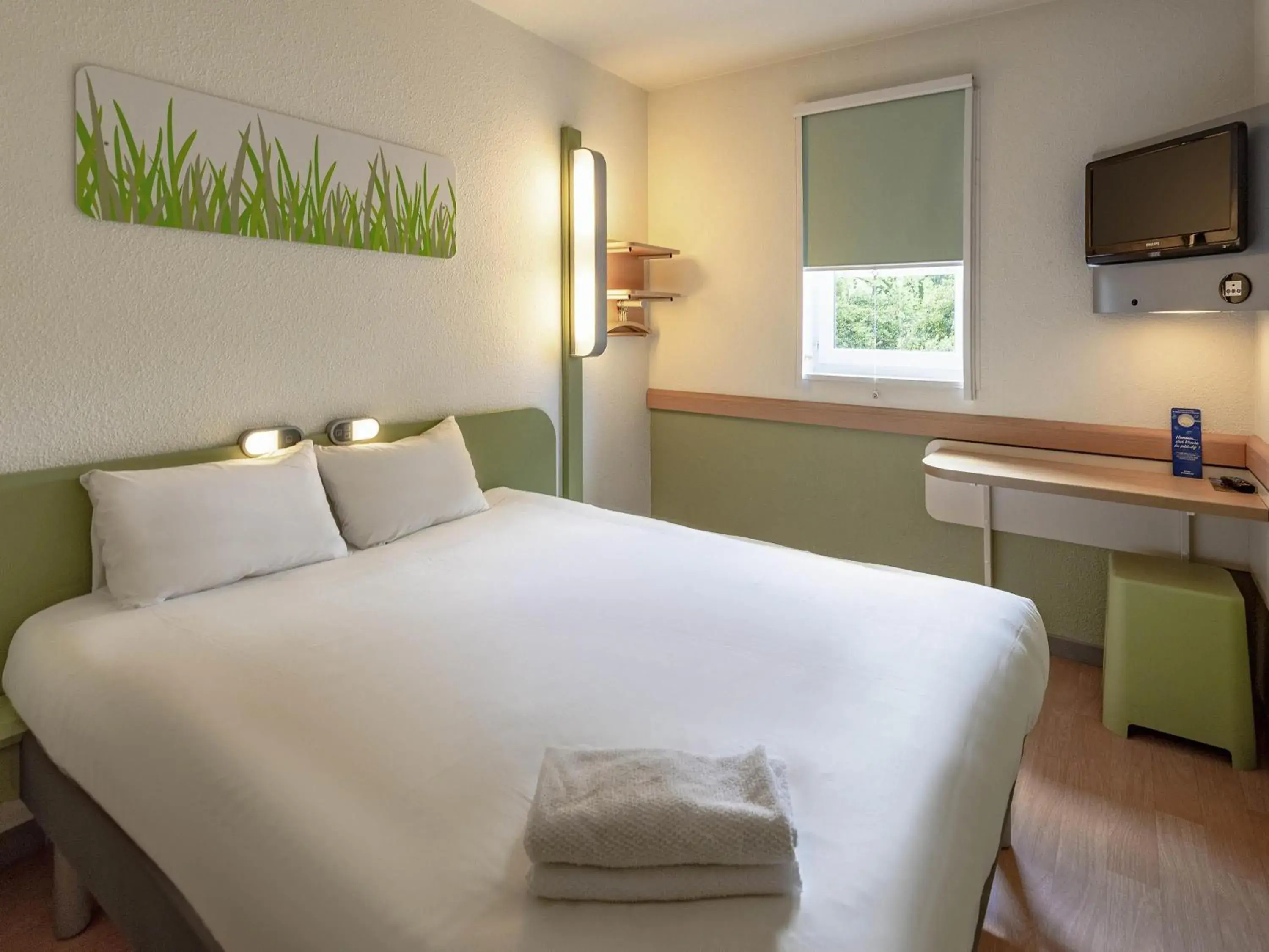 Bedroom, Bed in ibis budget Bergerac Bedroom, Bed in ibis budget Bergerac