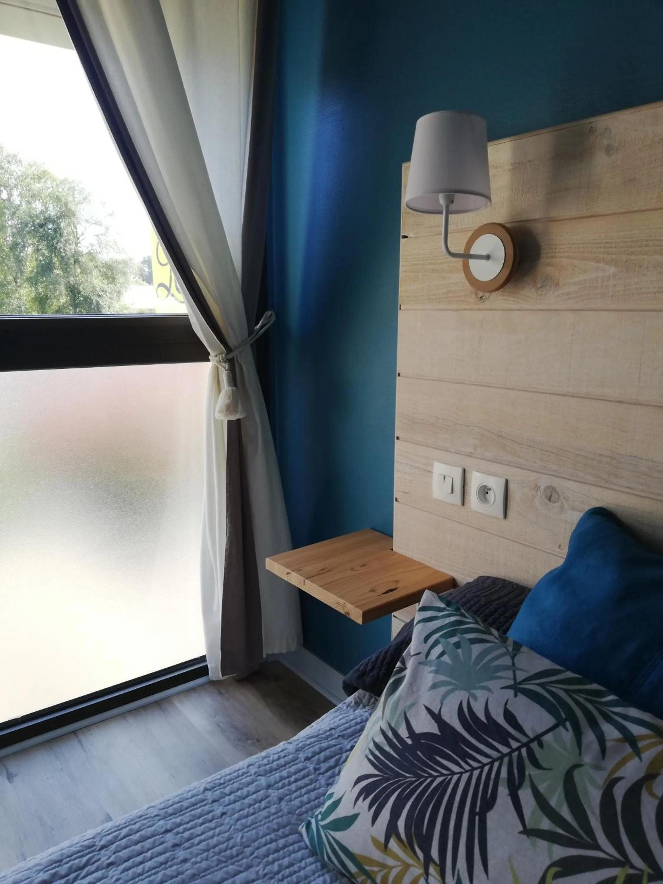 Bed in Logis Hotel Restaurant l'Orée Des Bois