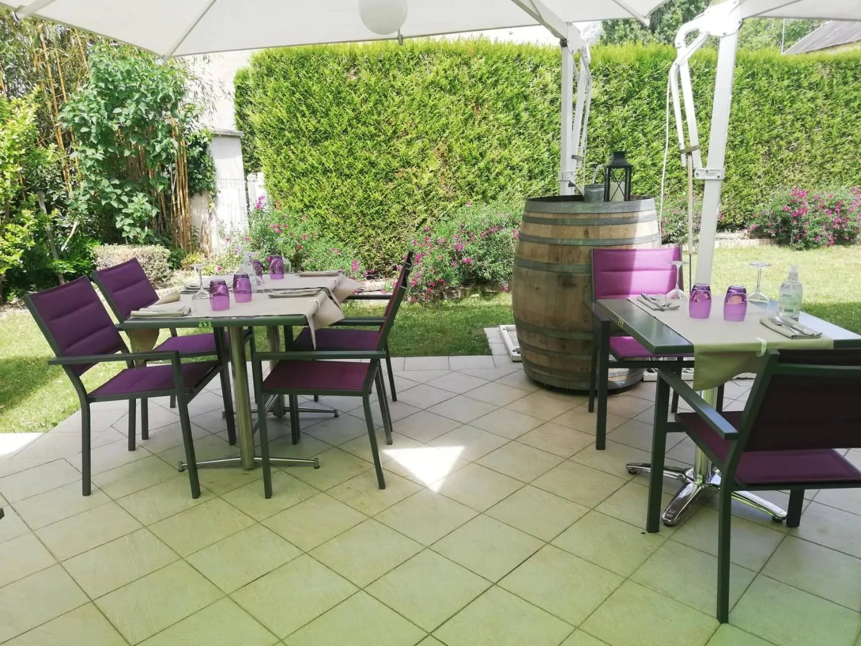 Patio in Logis Hotel Restaurant l'Orée Des Bois