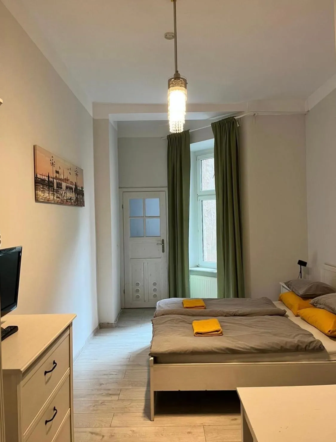 Bed in Colourful Rooms Wrocław